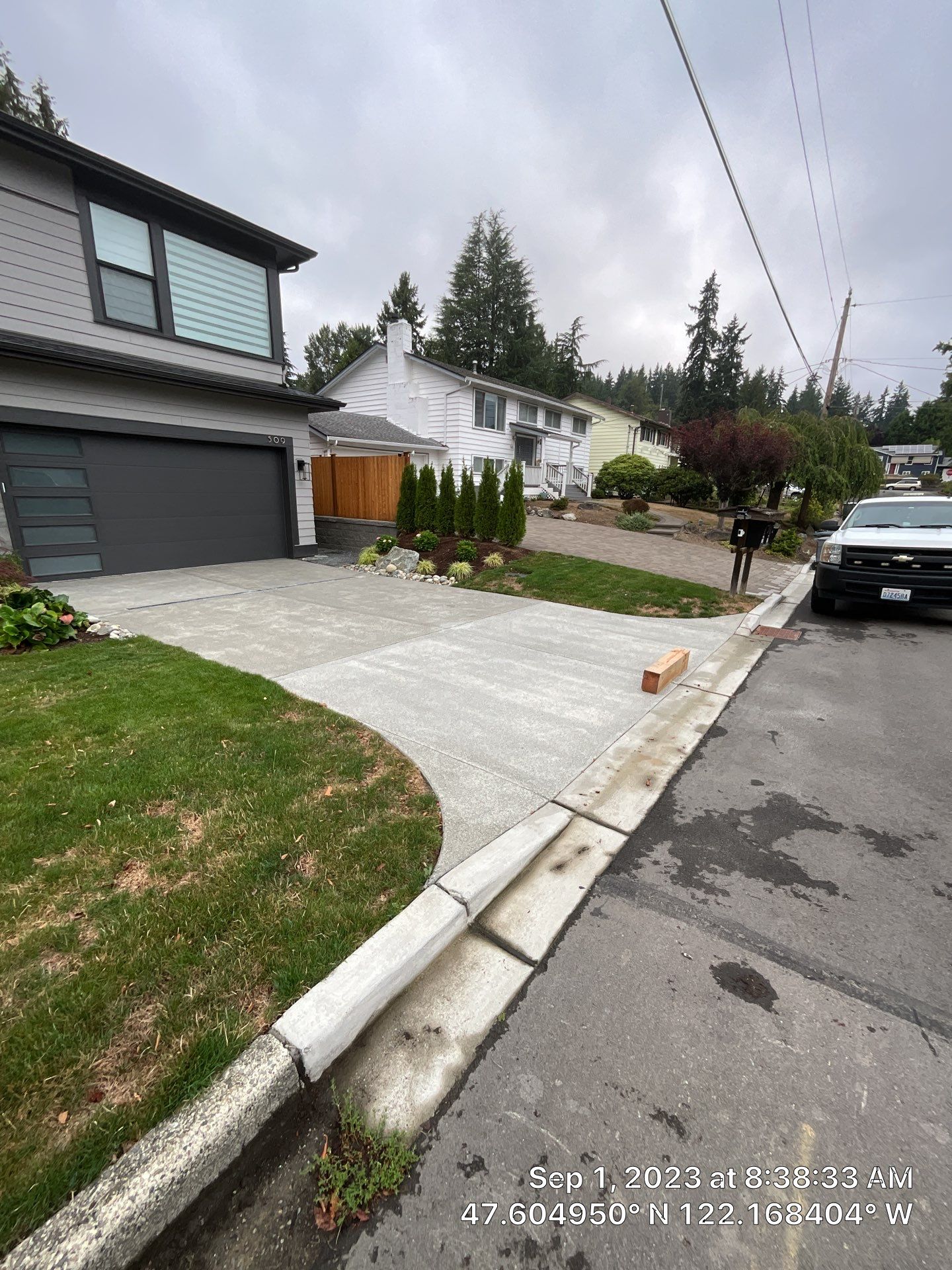 MN Custom Homes | Concrete Driveway  by Jireh Asphalt & Concrete Inc 