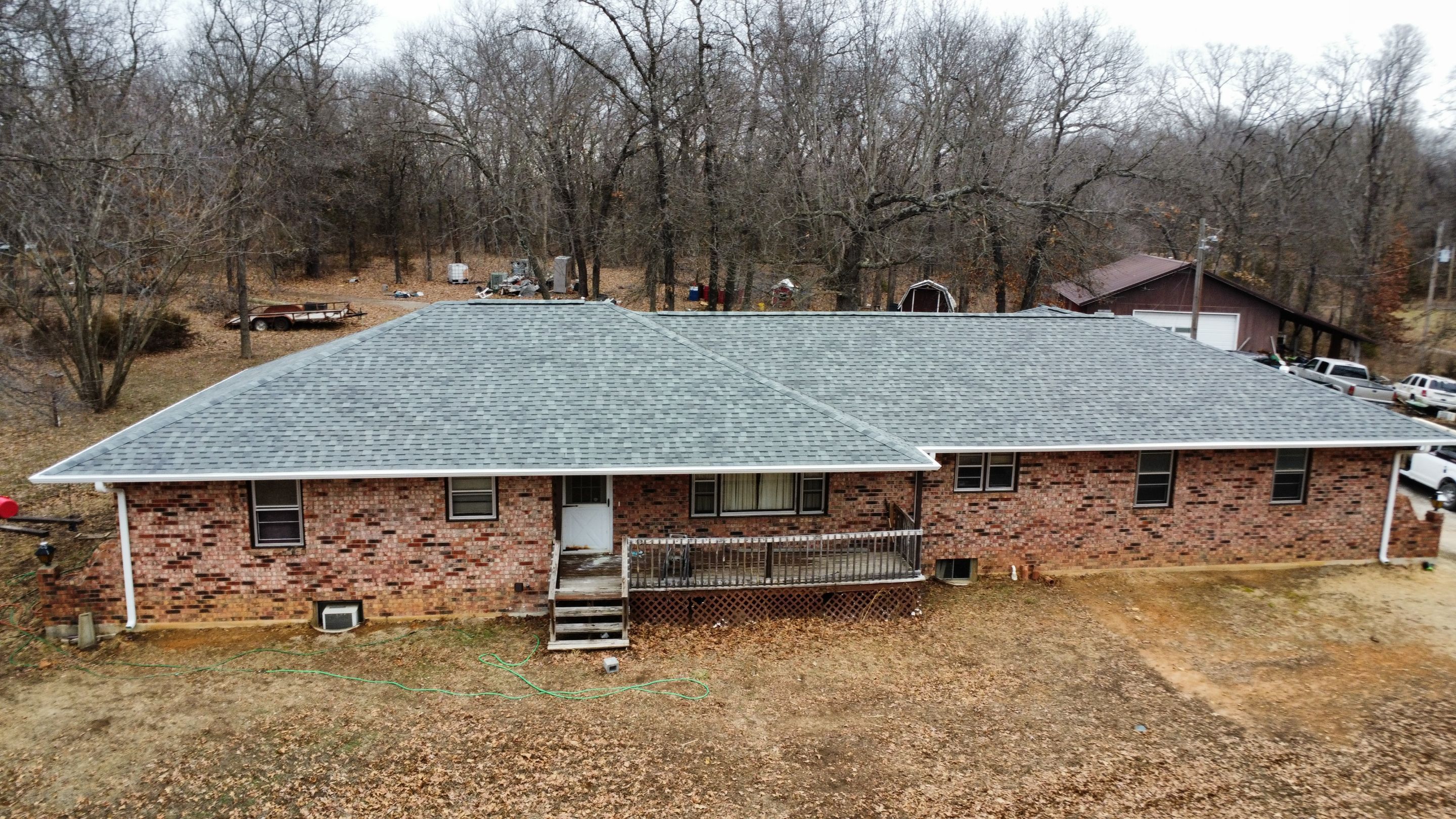 Residential Roofing + Gutters & Downspouts & Downspouts Install  by Titan Commercial & Residential Roofing 