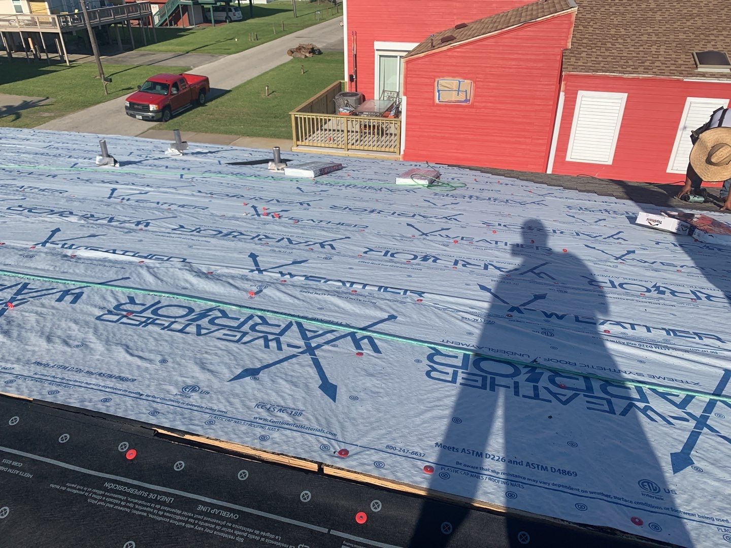 Galveston Waterfront Roof Installation In Progress by Elite Roofing LLC
