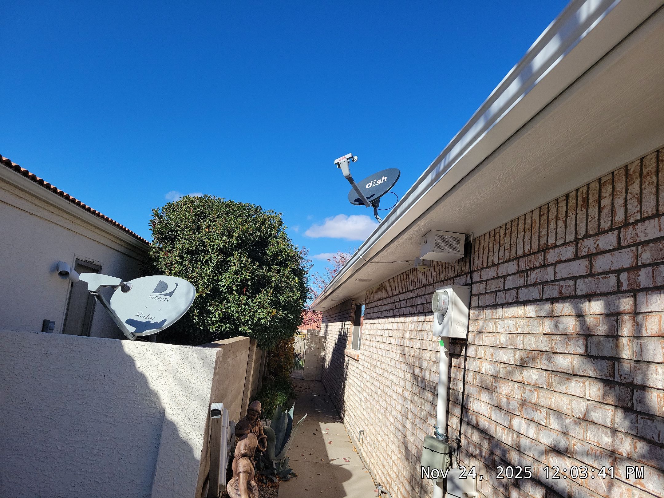 Seamless White Gutter and Downspout Installation in Albuquerque by Doyle Roof Masters Inc