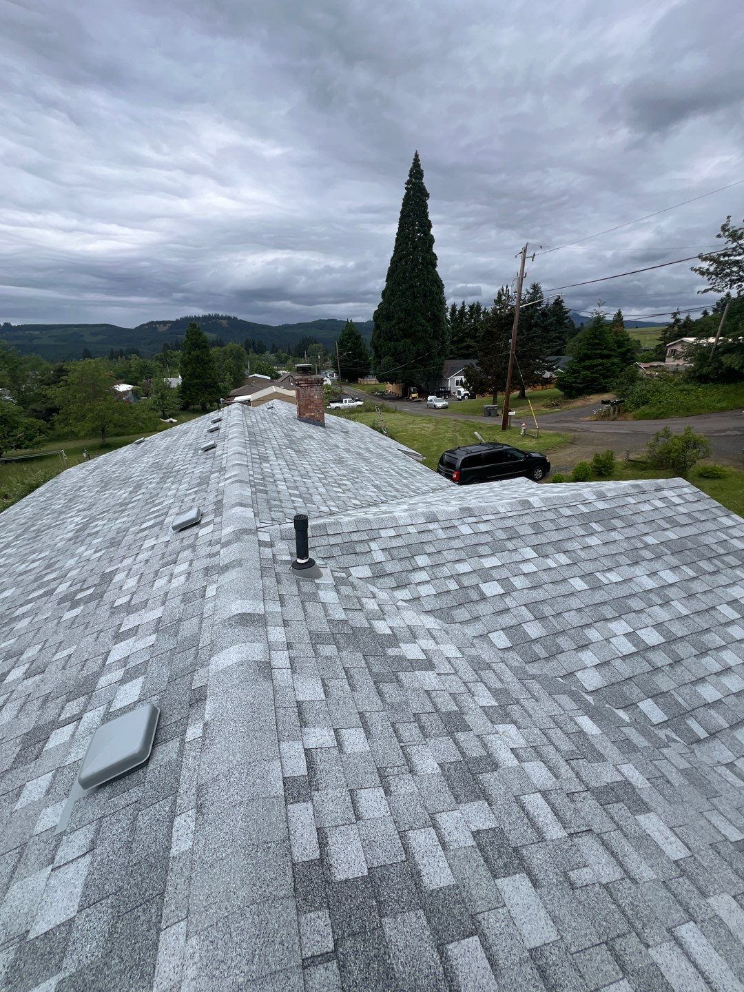 Residential Roofing Installation using IKO Dynasty (Color: Frostone Grey) by Orezona Building & Roofing Company, Inc.