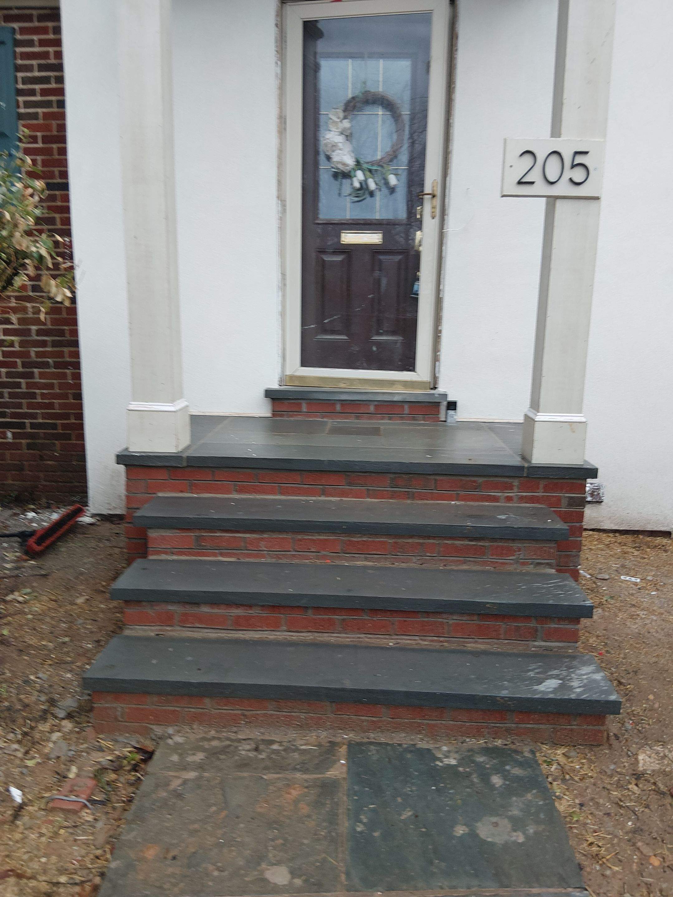 Custom Brick Step and Metal Railing Installation in Silver Spring by Capitol Iron Works
