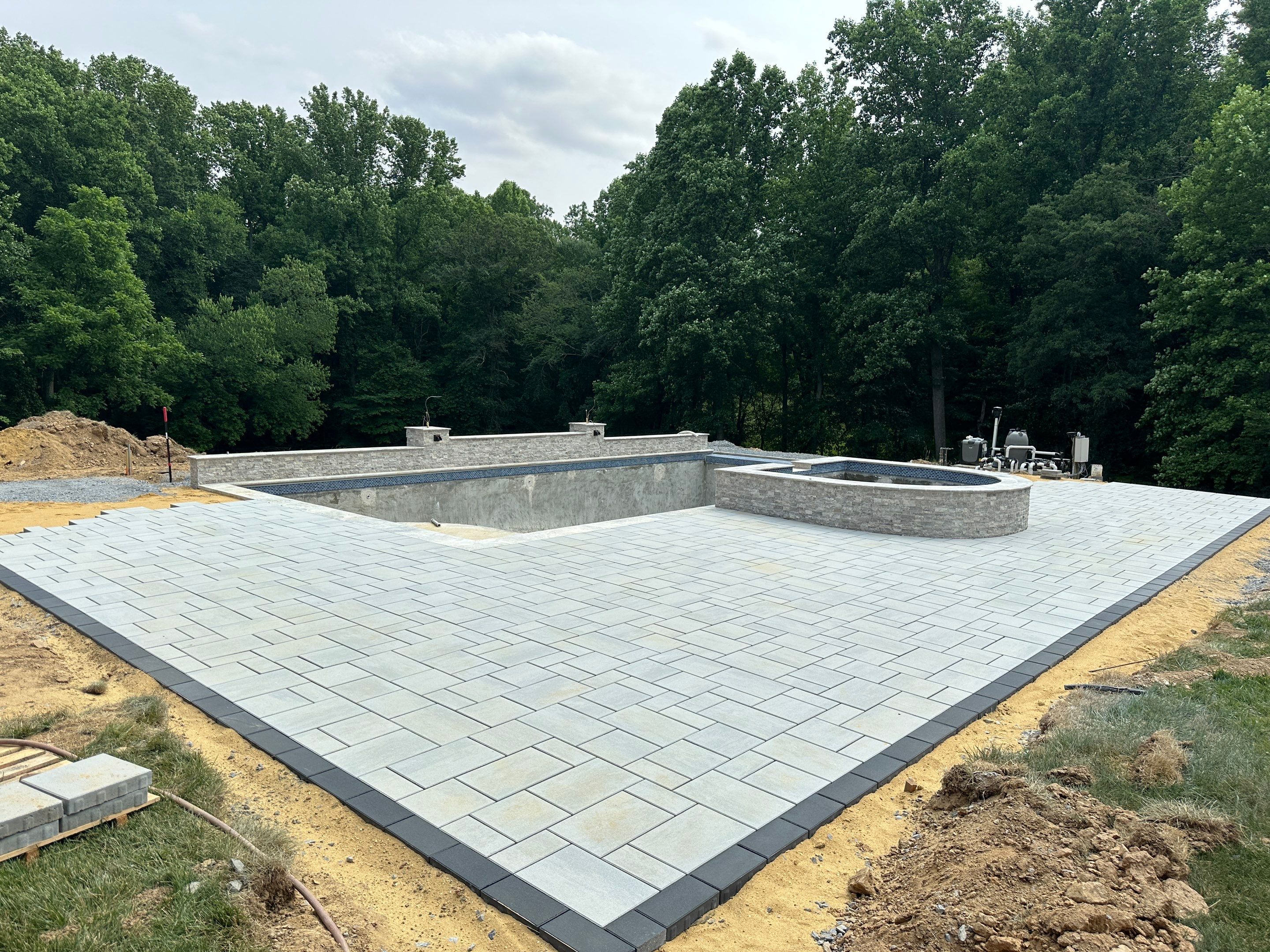 Gunite Pool w/ Spa and Water Features  by Elysium Pools