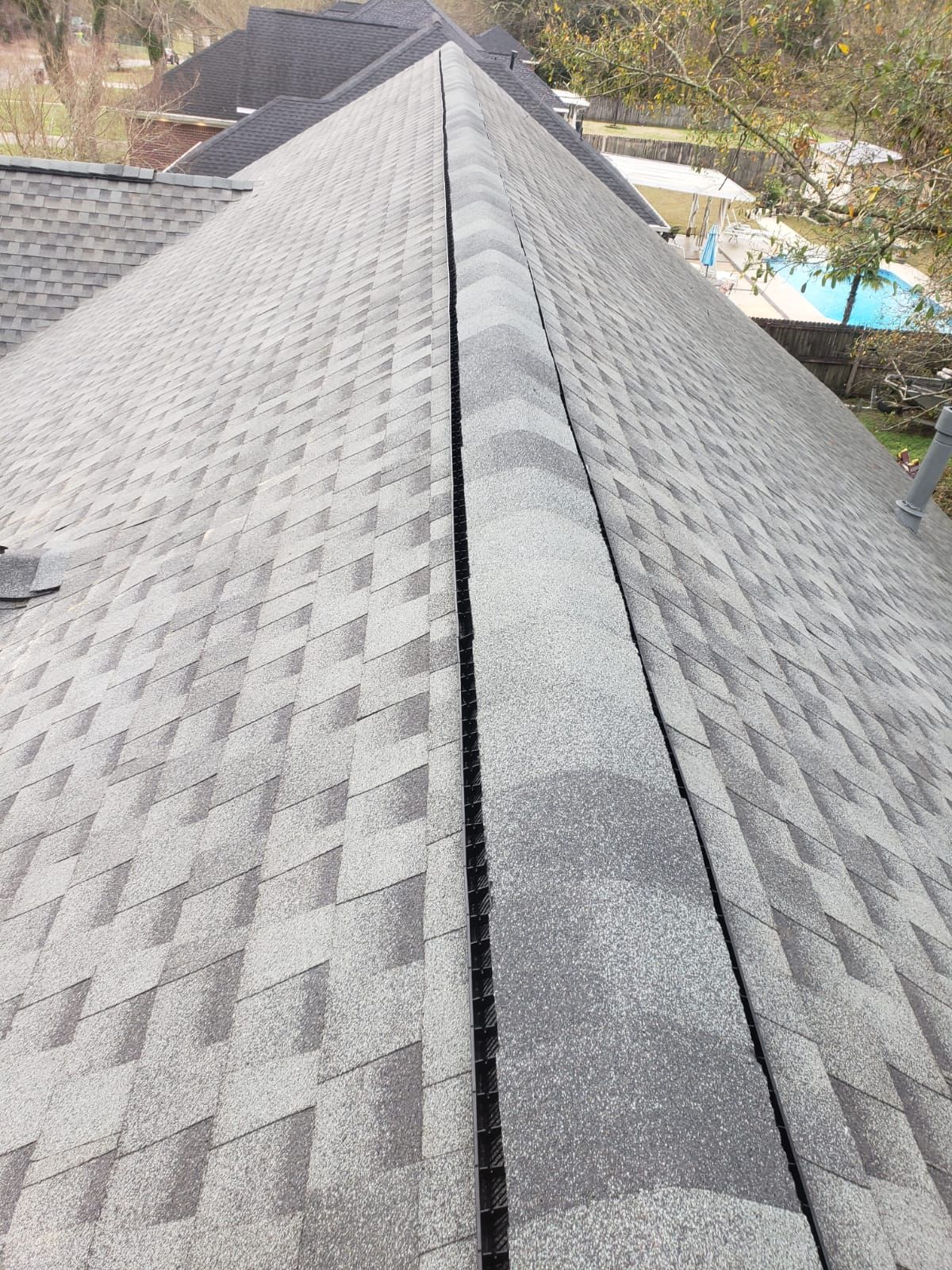 Residential Roofing Installation using Roof Replacement by American Roofing & Construction LLC