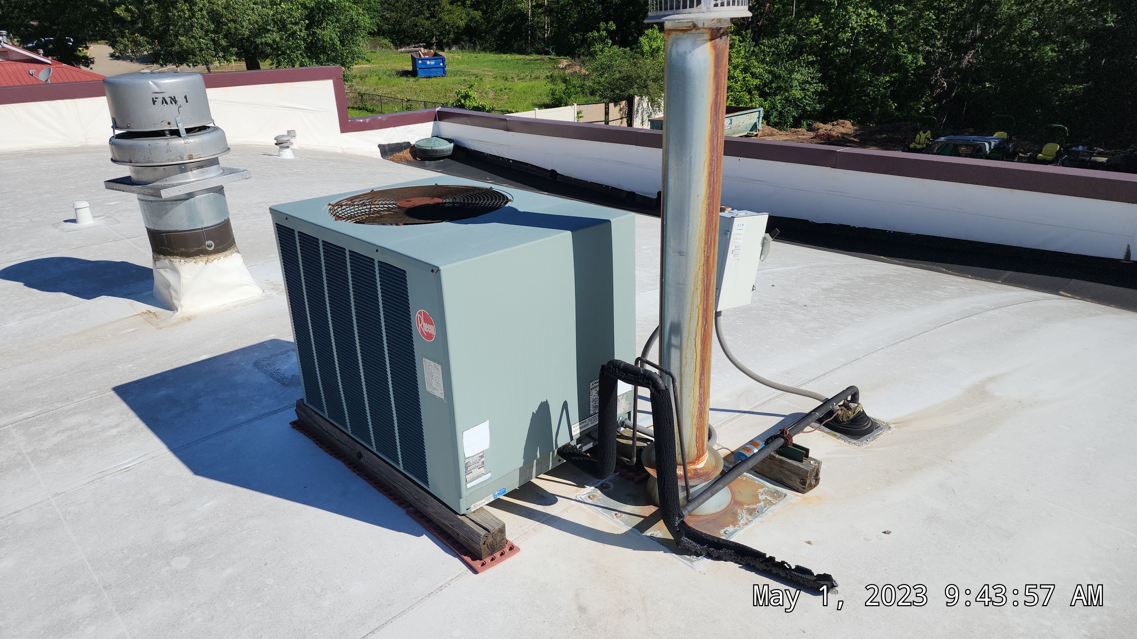 Choctaw Nation Healthcare Center - White Building by Hostetler Roofing