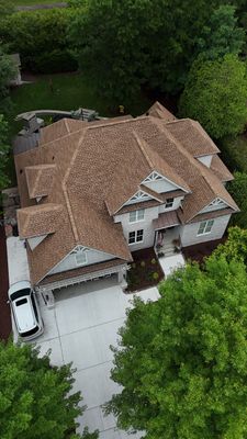 Roof Replacement - GAF Timberline HDZ Shakewood - 6” coppertone seamless gutters 