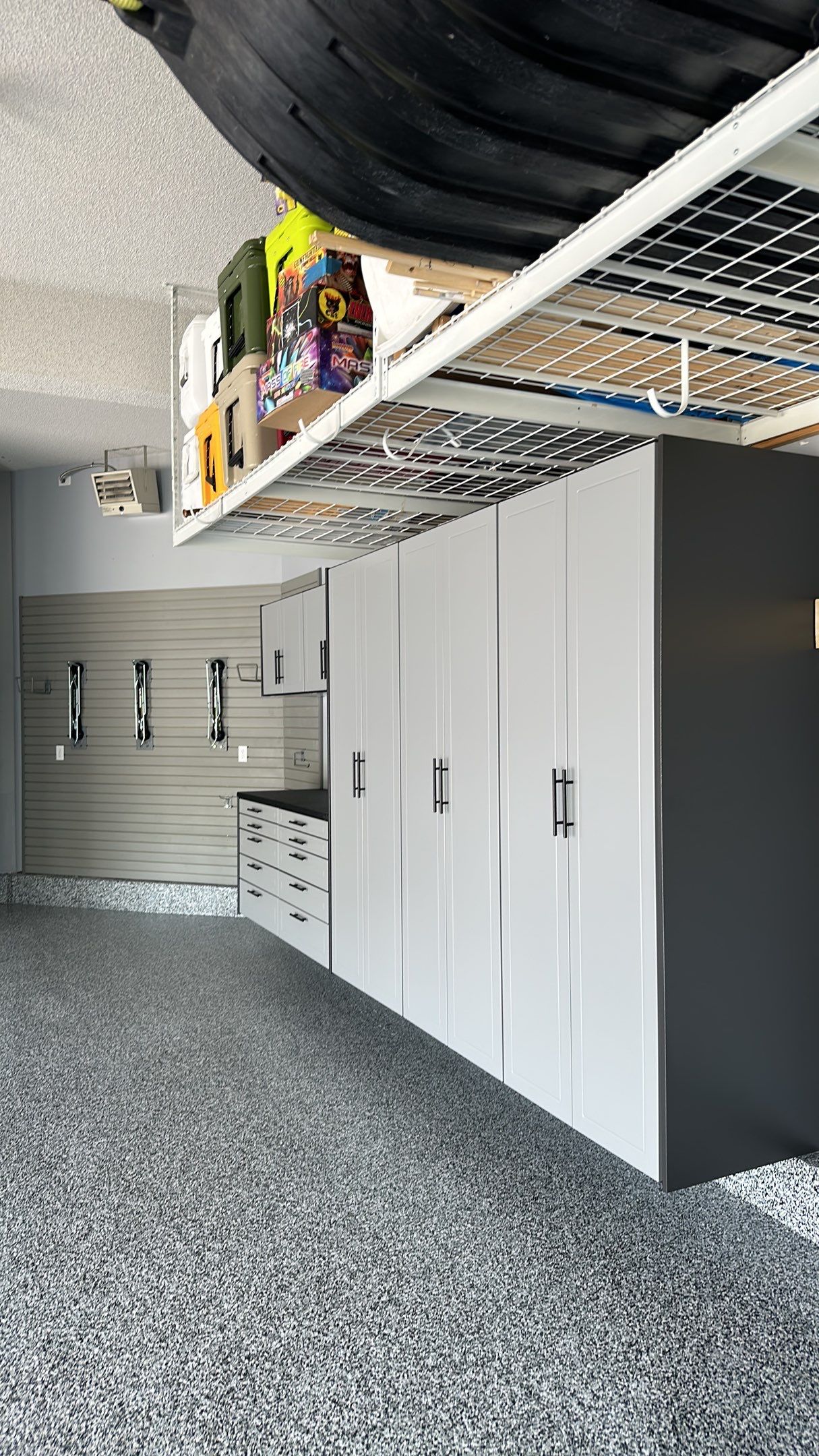 Matt N. took his garage to the next level with our Domino floor and cabinets by Banner Garage