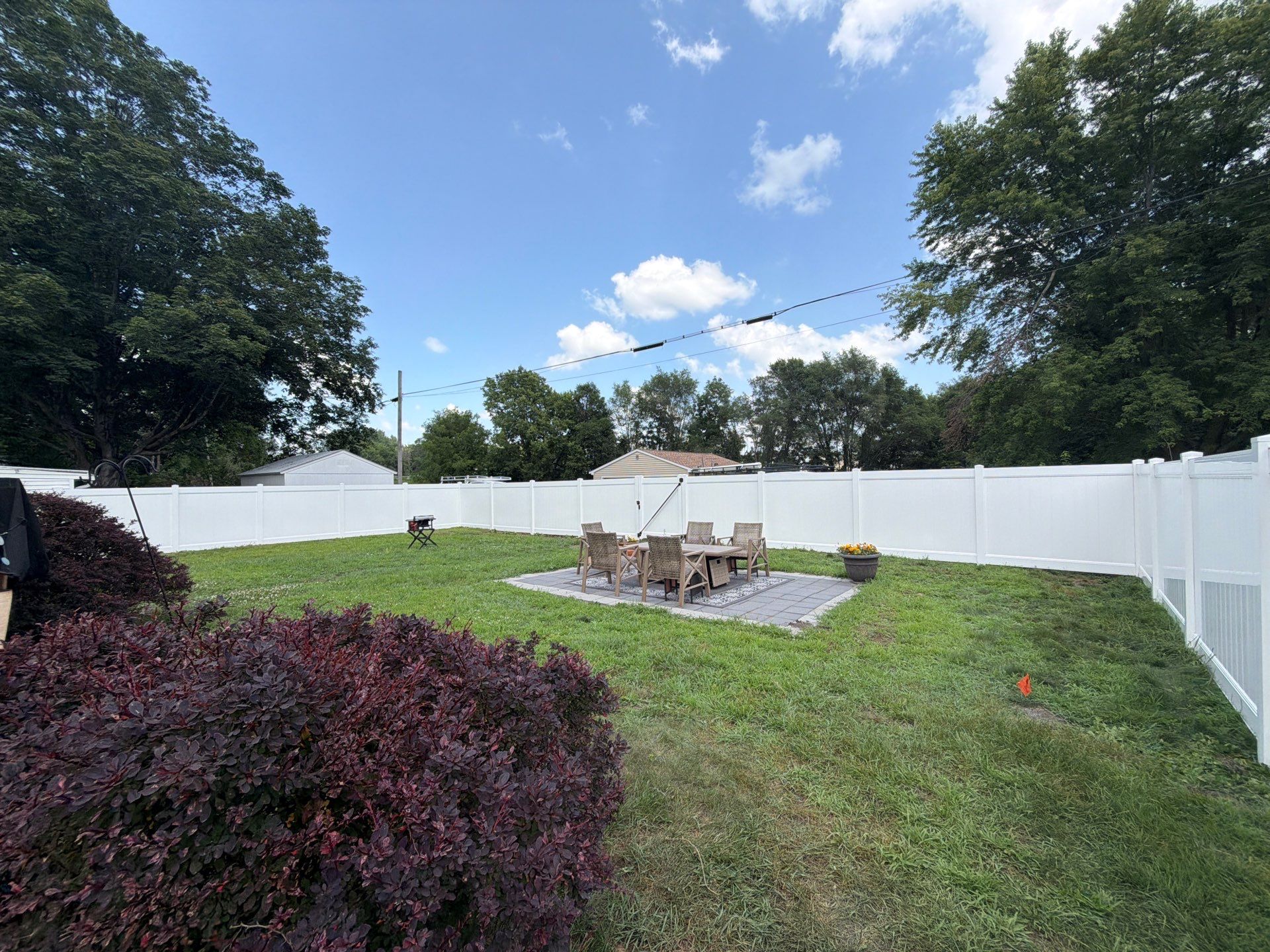 White Vinyl Privacy Fence Installation in Waterloo, Iowa by Perfect Picket Fence and Stain