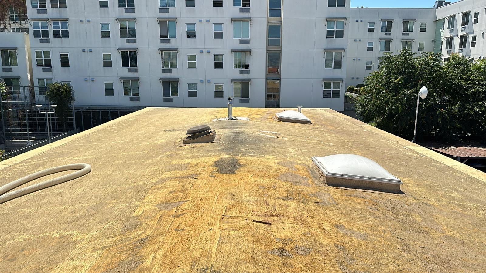 Foam Refurbish using Conklin Benchmark/PUMA XL coatings and spray foam by Straight Edge Roofing Inc