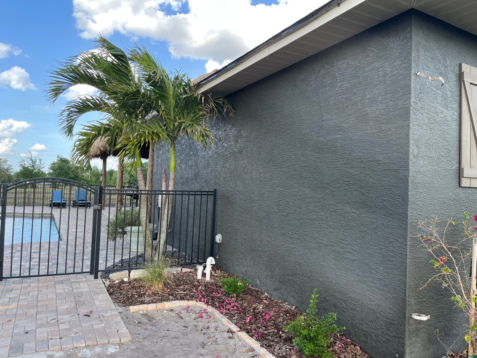  7-inch White seamless gutters and downspouts in Myakka City FL by Gutter Professors