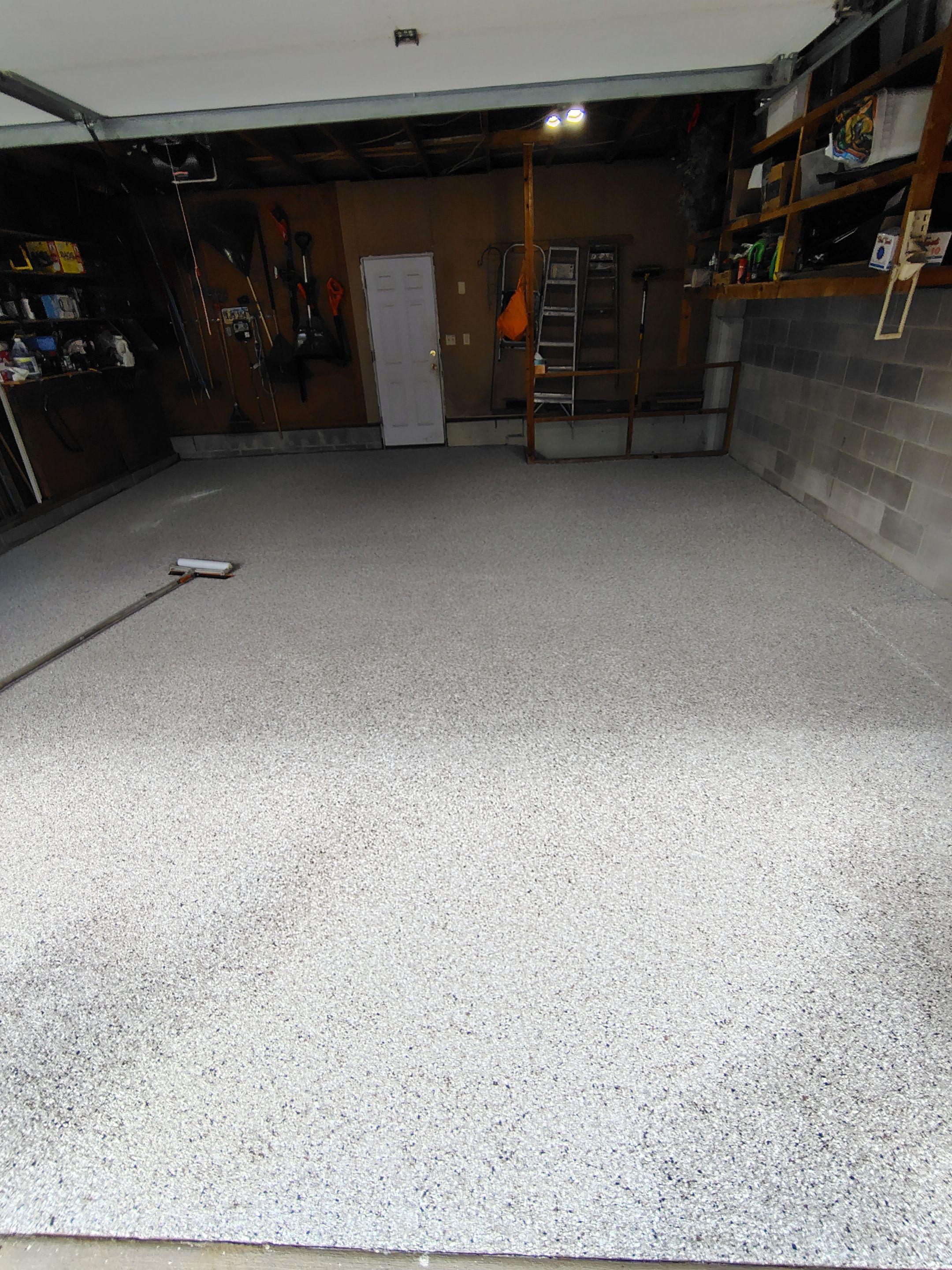 Sioux Falls Garage Epoxy Floor Installation and Concrete Crack Repair by Select Painting, Coatings & Garage Cabinets
