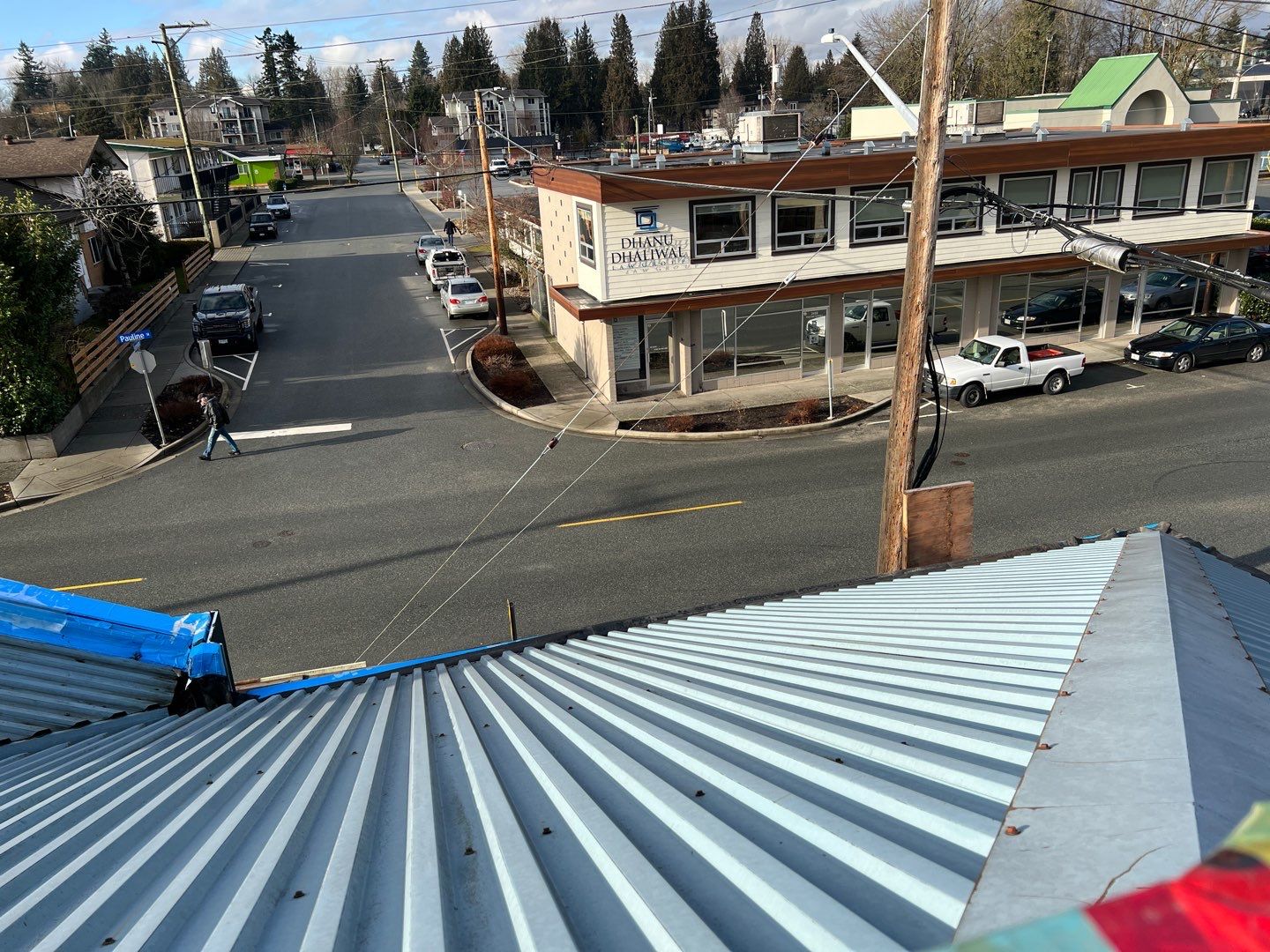 Commercial Roofing Installation using 12" Prolok metal and hidden gutters! by Top Notch Roofing Inc
