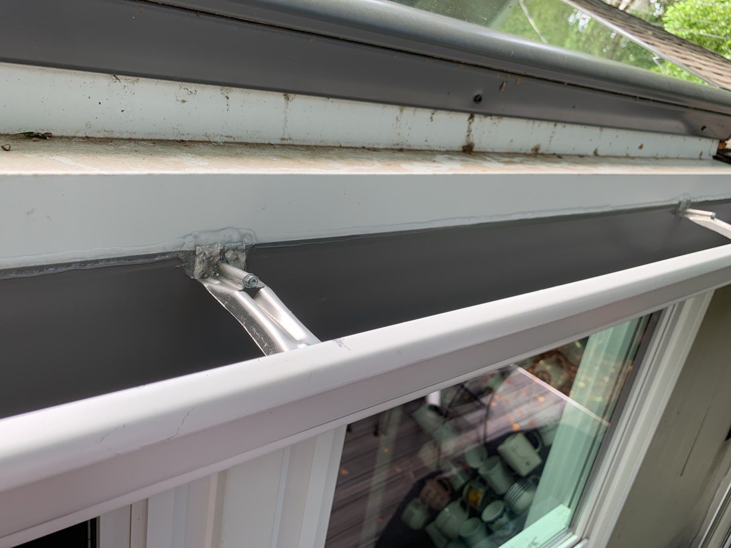 Skylight and Gutter Replacement by American Home Contractors