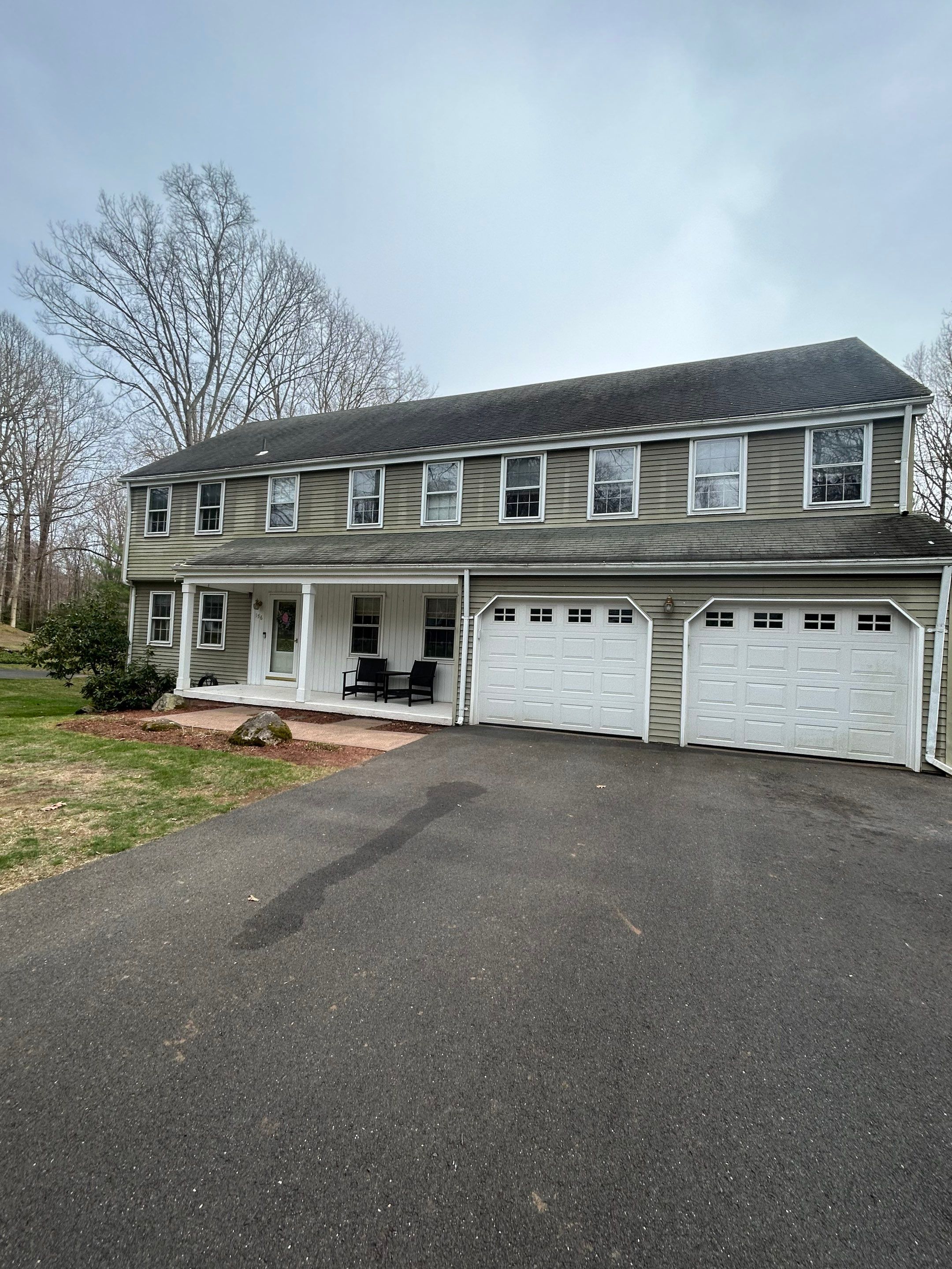 Glastonbury Exterior Renovation with Castle Stone Siding & Stone Entry Upgrade by Turner Home Improvement Contractors, LLC