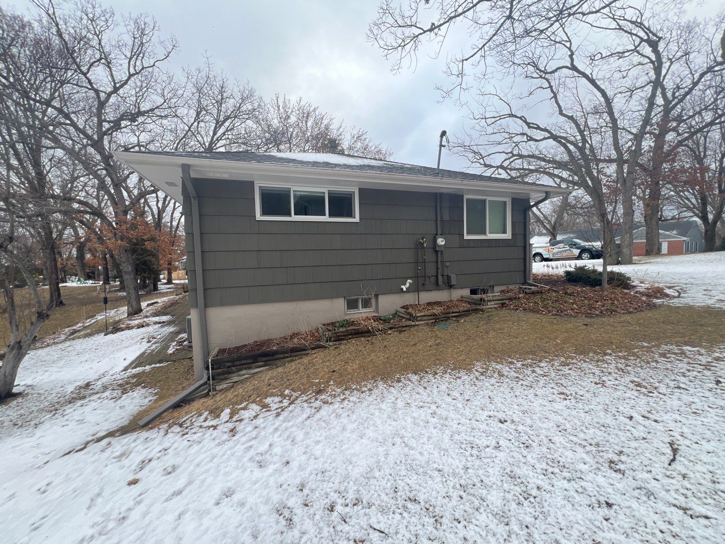 Siding Replacement – LP Smartside ExpertFinish in Tundra Gray | Hopkins, MN by First Impressions Exteriors