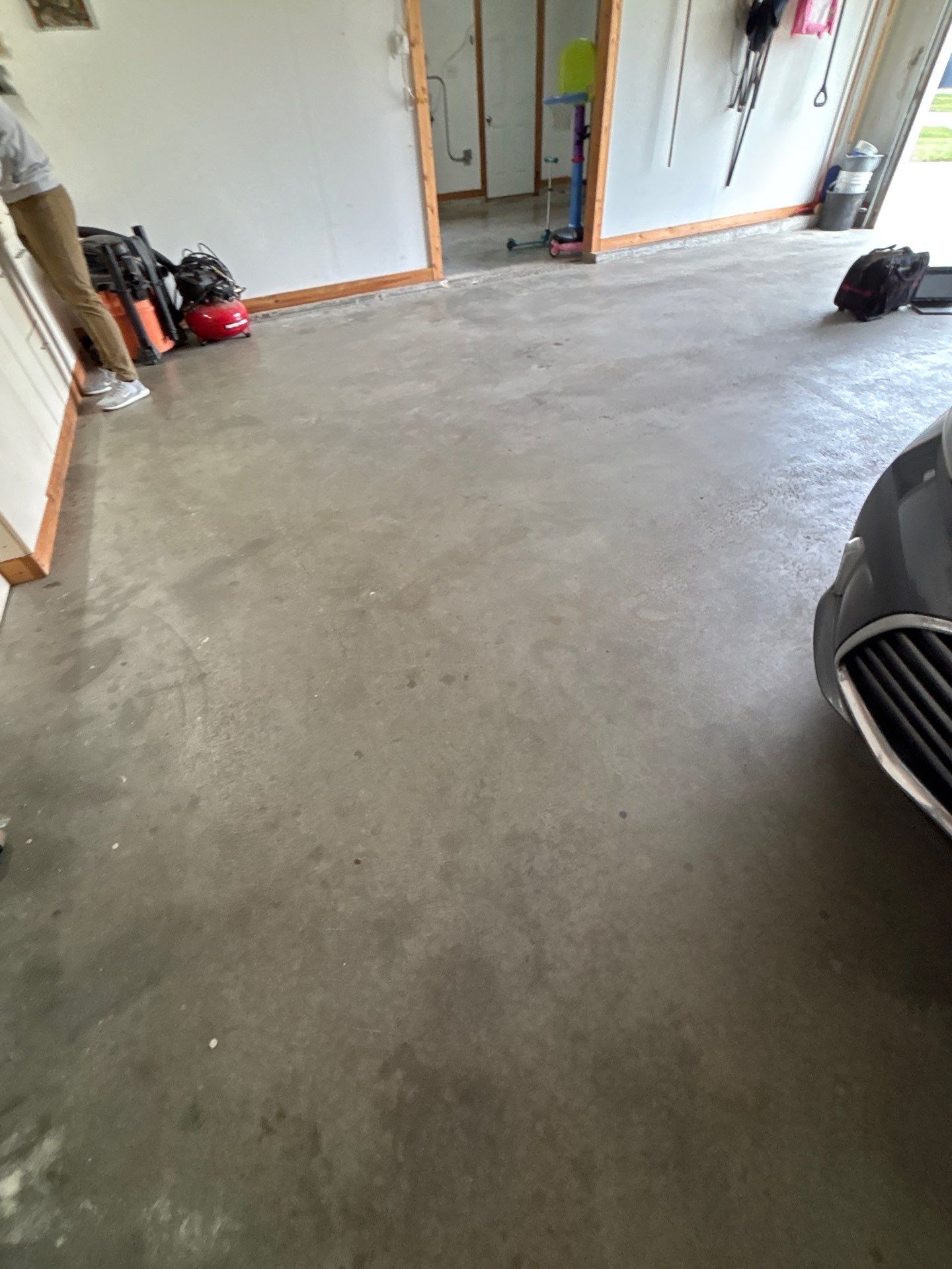 Gray and Black Speckled Polyurea Garage Floor in Dell Rapids by Select Painting, Coatings & Garage Cabinets