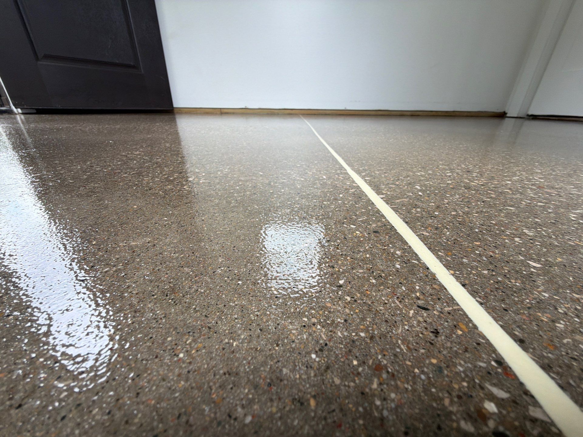Speckled Epoxy Floor Installation and Concrete Refinishing in Nunica by Gordon Painting