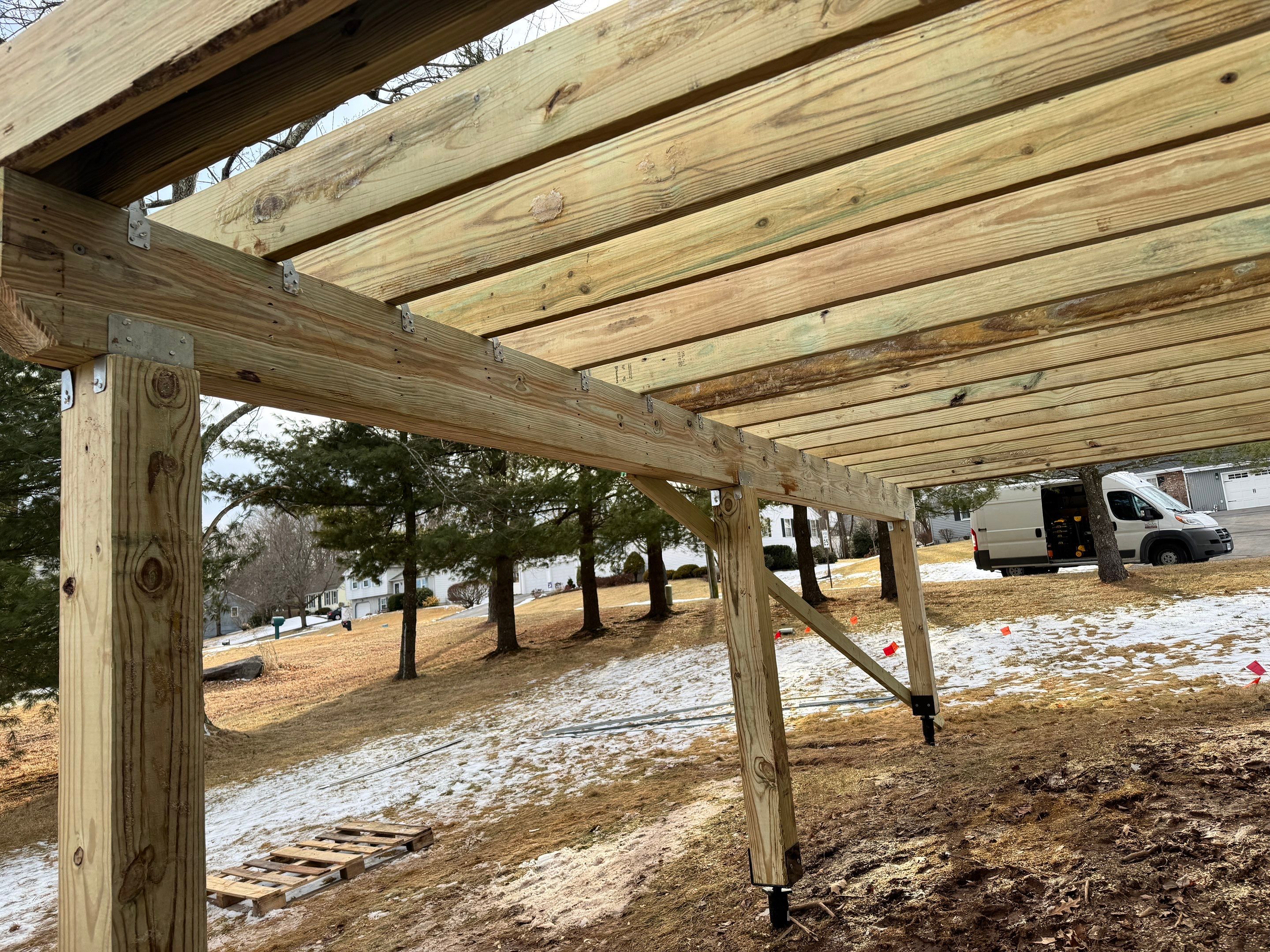 Deck replacement with Trex Select Saddle and White Select T rail. by DiGiorgi Roofing and Siding Inc