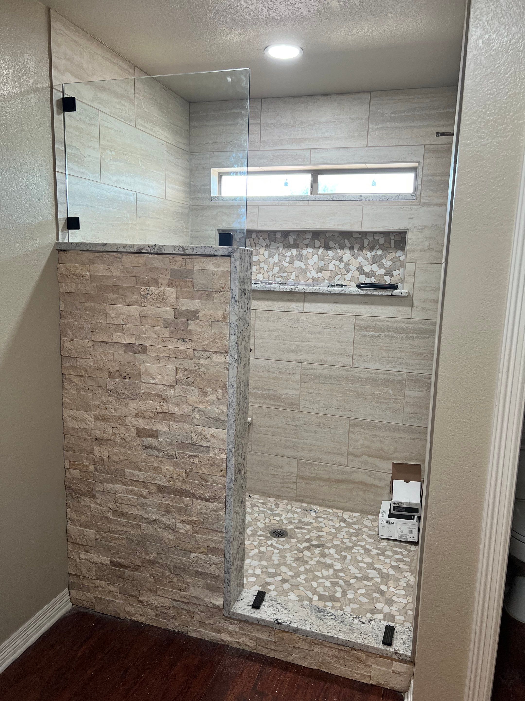 Bathroom Shower Remodel for a client by First United Roofing & Construction
