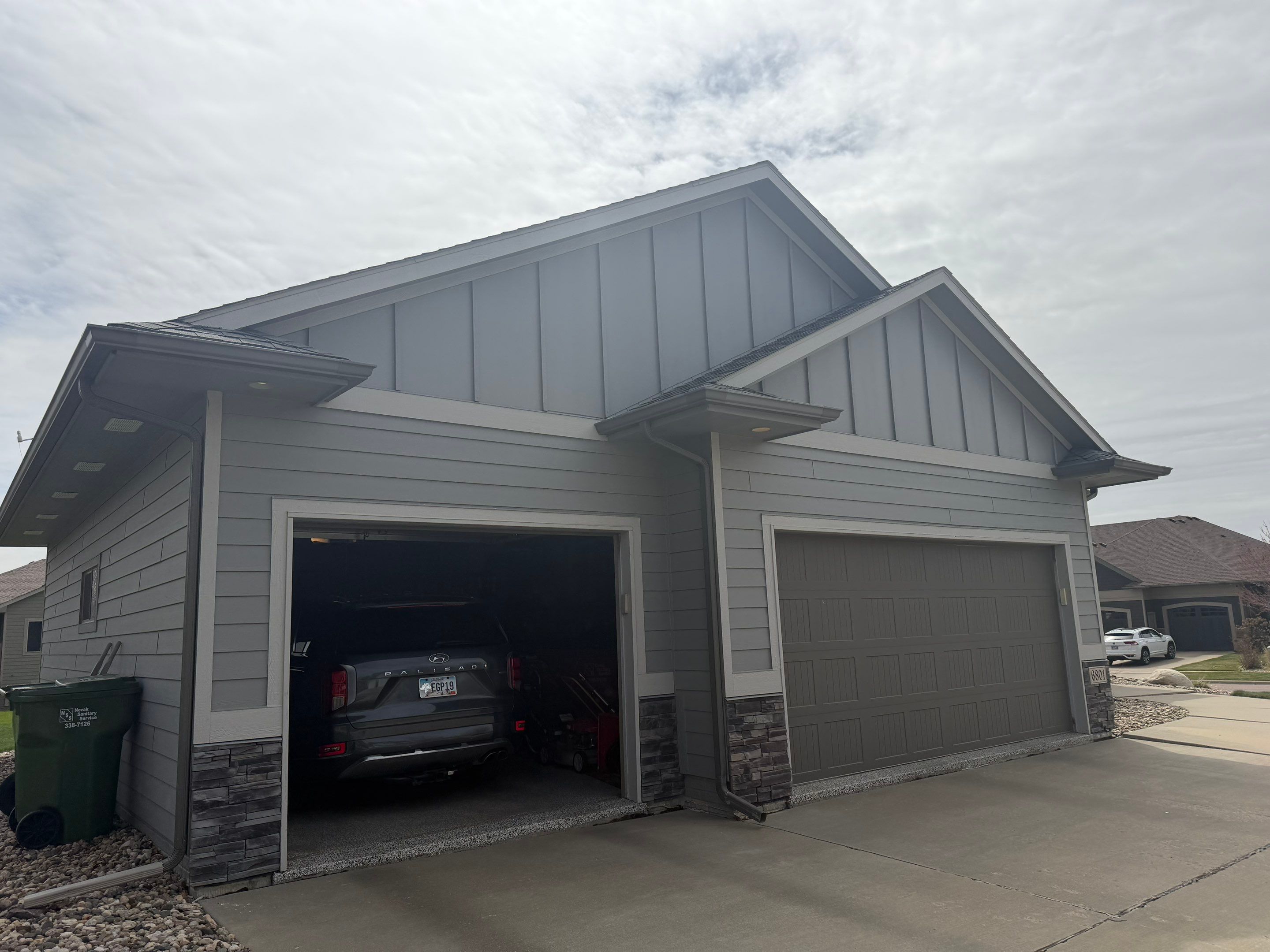 Residential Exterior Painting and Siding Maintenance in Sioux Falls by Select Painting, Coatings & Garage Cabinets