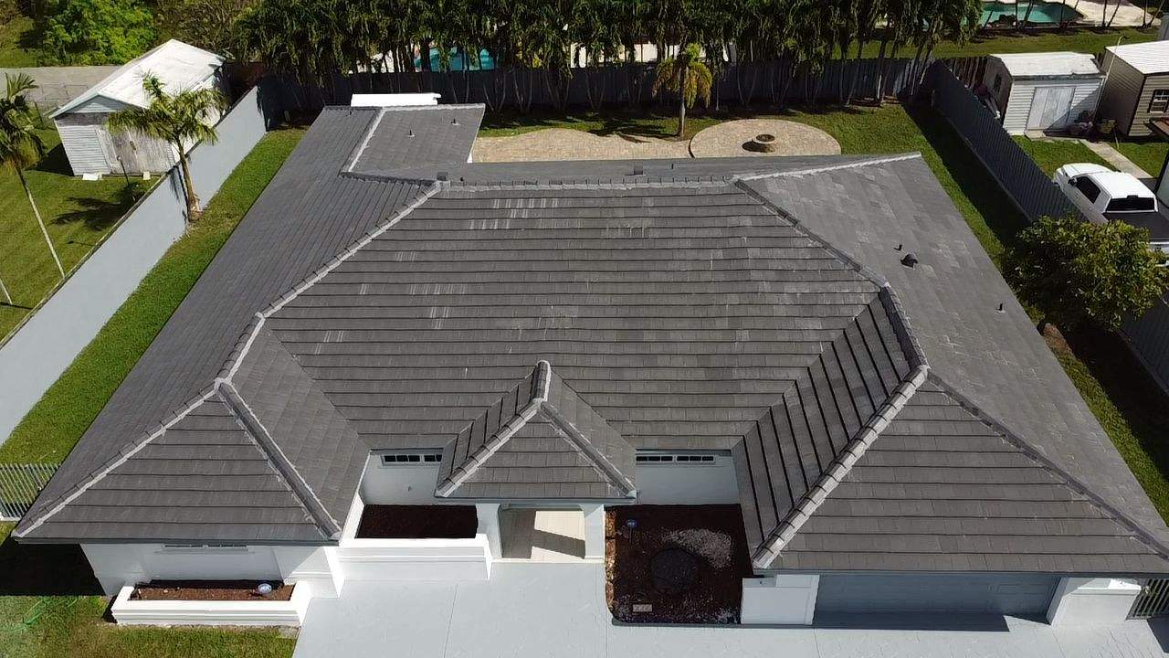 Residential Roofing Installation using Tile Roof by City Roofing Inc