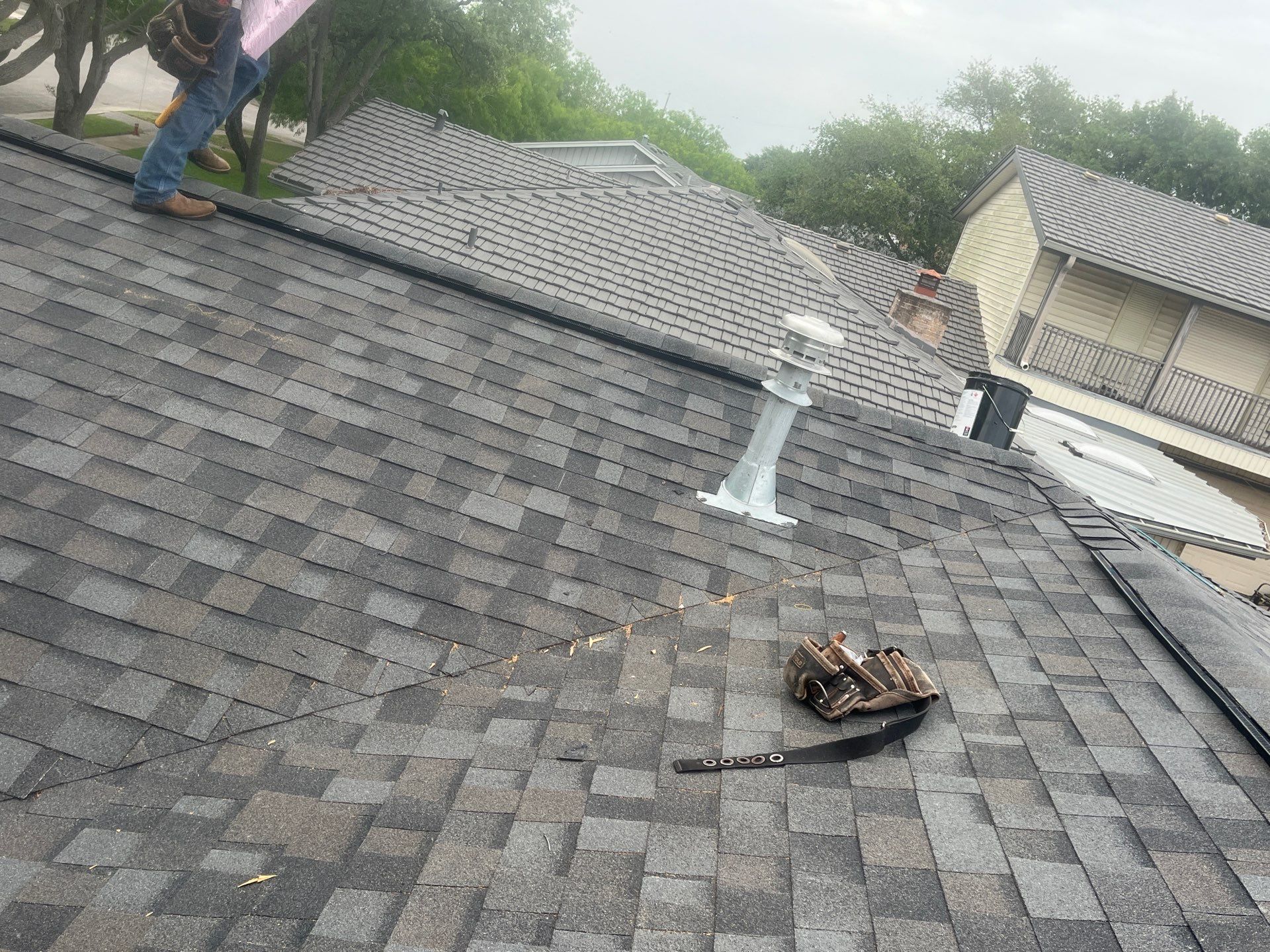 Colored Vinyl Windows to blend into brick by Bayfront Roofing and Construction