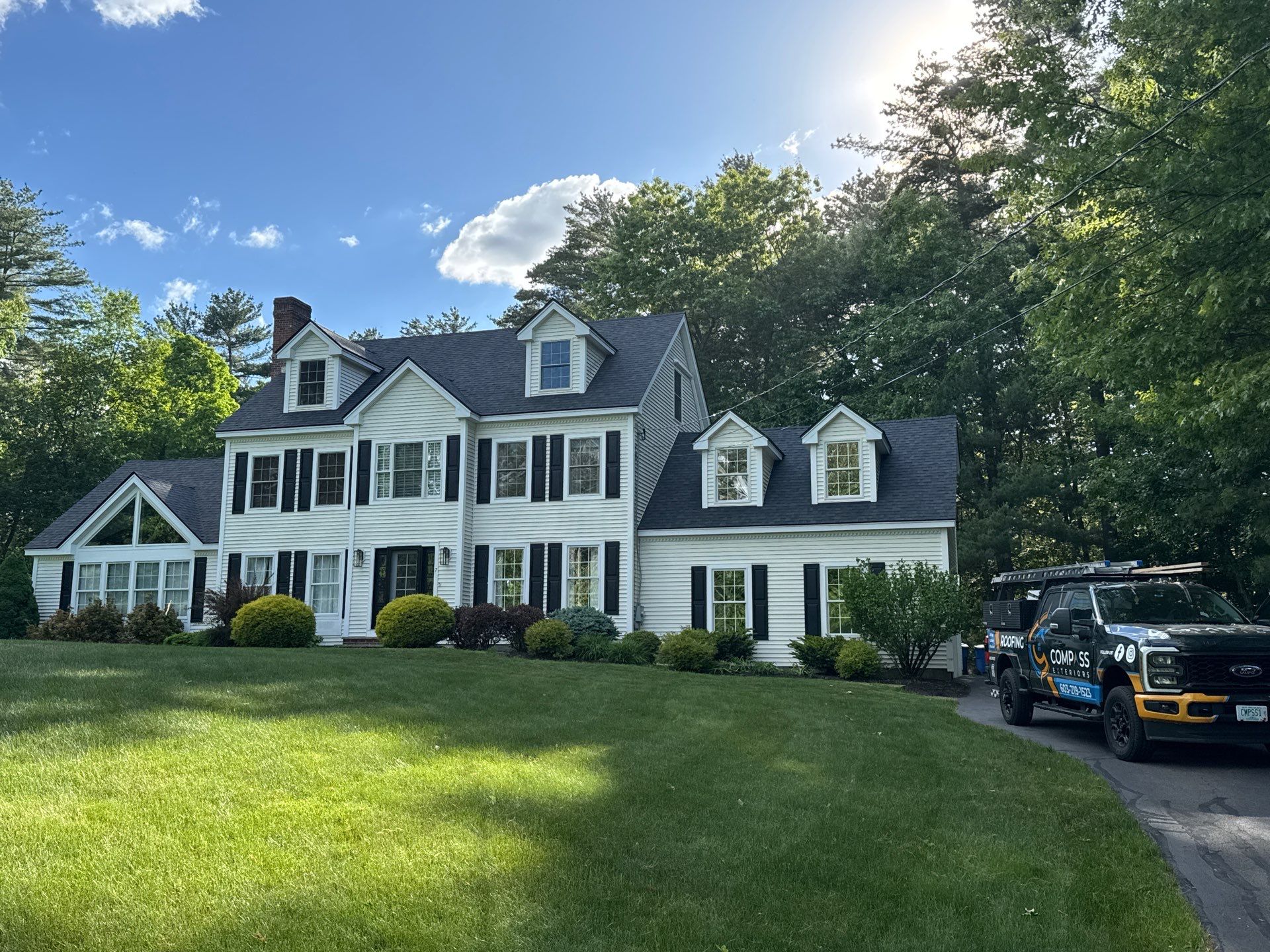 Roof Replacement on Cobbetts Pond in Windham, NH with Owens Corning Onyx Black Shingles by Compass exteriors
