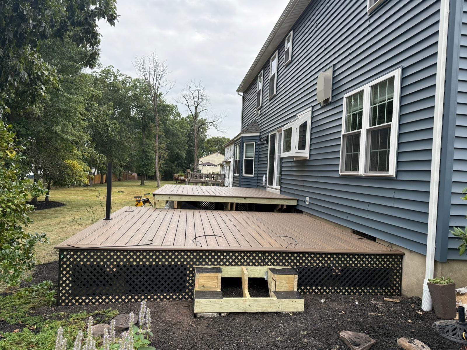 Deck resurface with Trex and cable rails by deck guardian