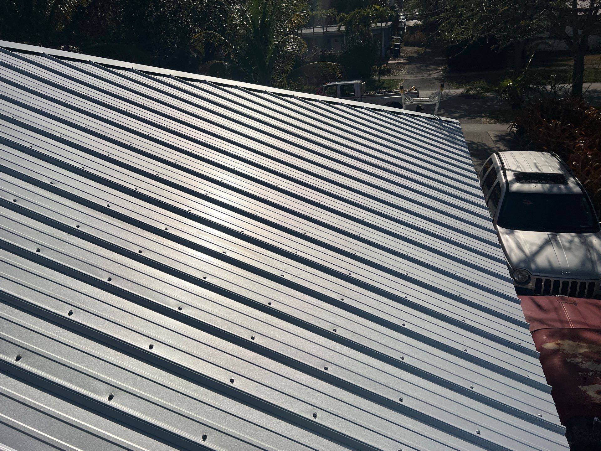 Residential Roofing Installation using Durabull Classic Rib Panel by Durabilis Roofing INC