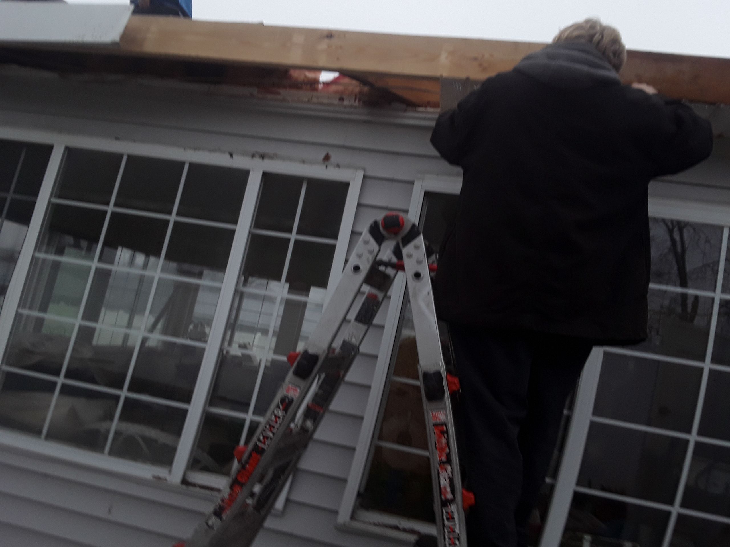 Rubber Roofing  on a residential sunroom by Secure Construction Company Inc
