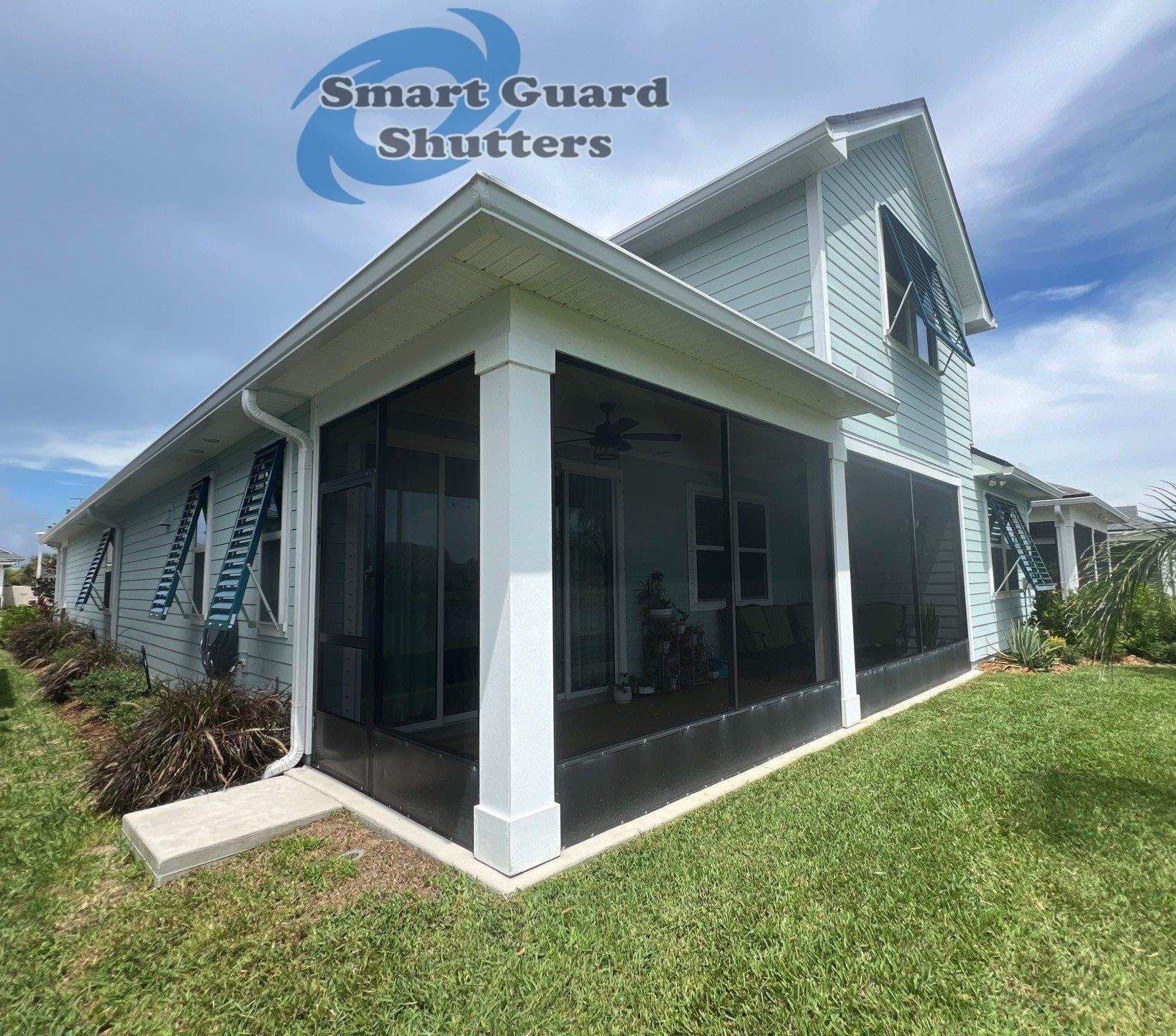 Impact Bahama Shutters in Ocean Blue by Smart Guard Shutters