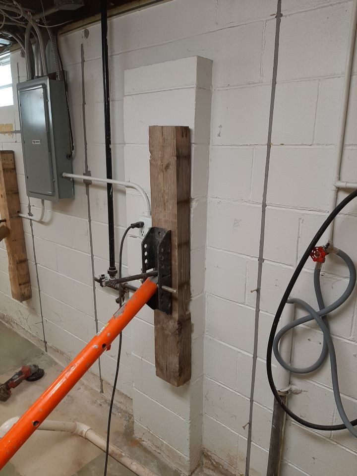 Wall Straightening and Reinforcement using Embedded Fiber Reinforcement by Toledo Basement Repair 