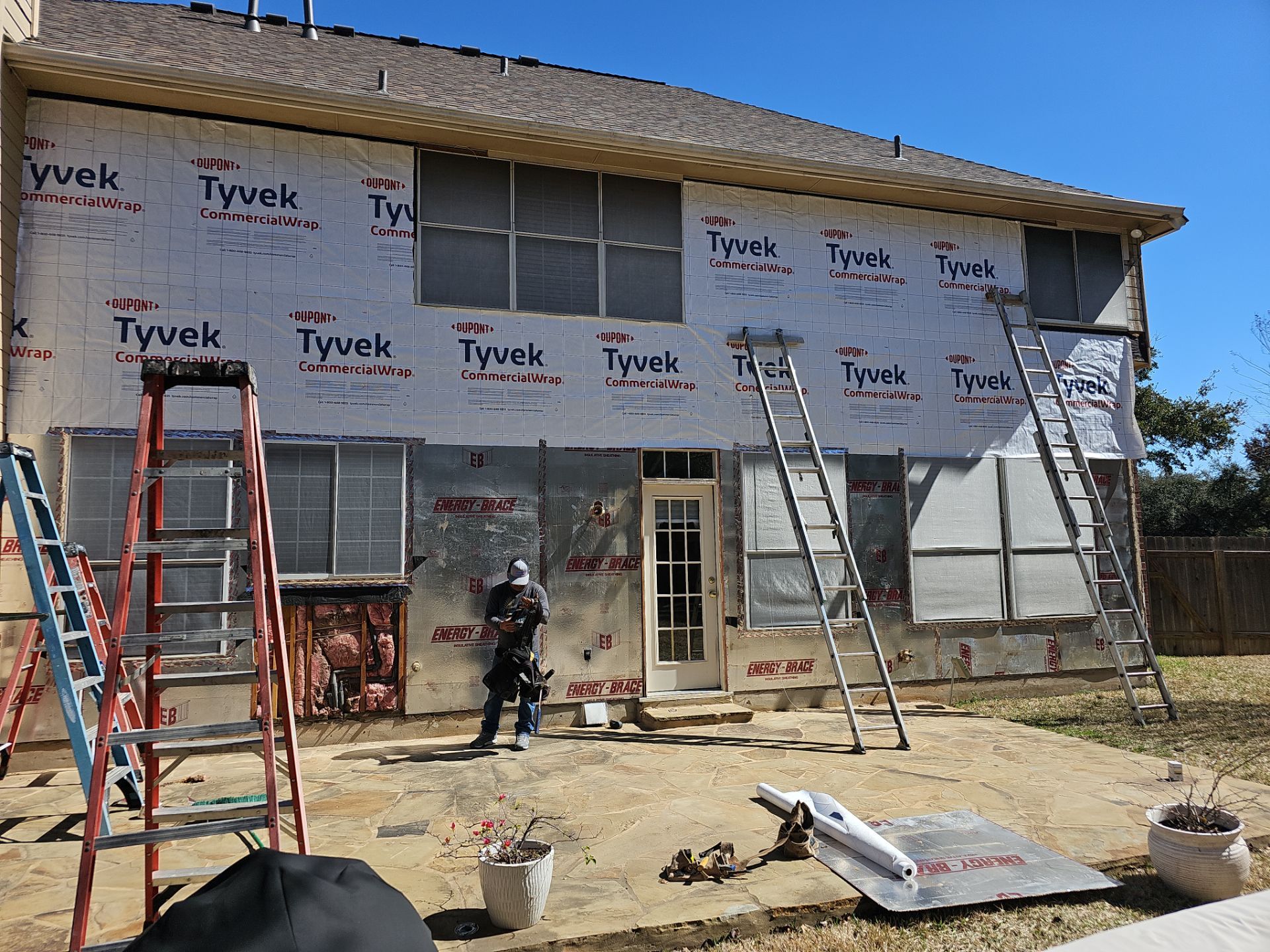 New Hardie Lap Siding & Board and Batten by DeZign Roofing & Exteriors