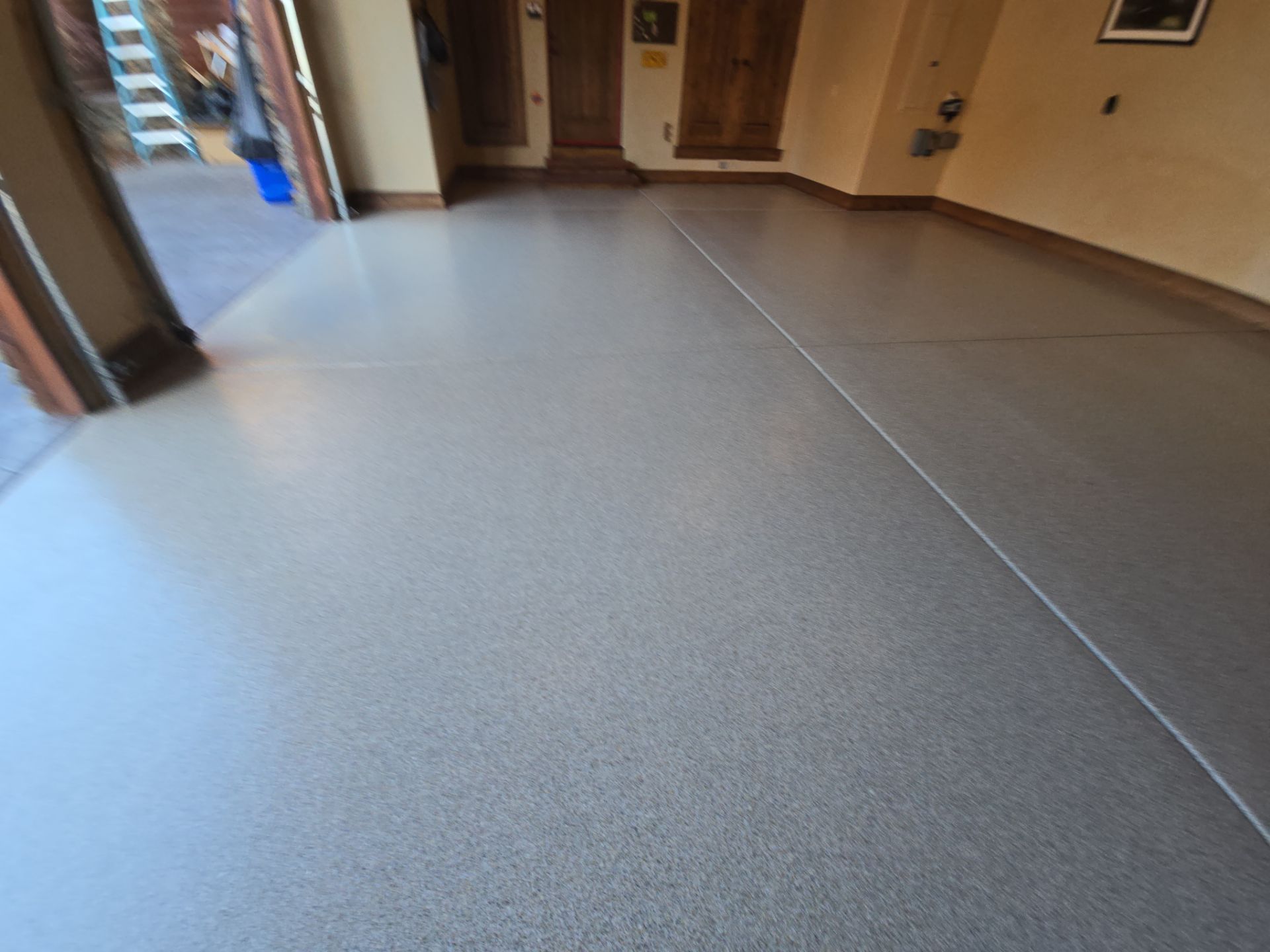Garage Transformation using Stone/Marble Hybrid by Croc Coatings, LLC