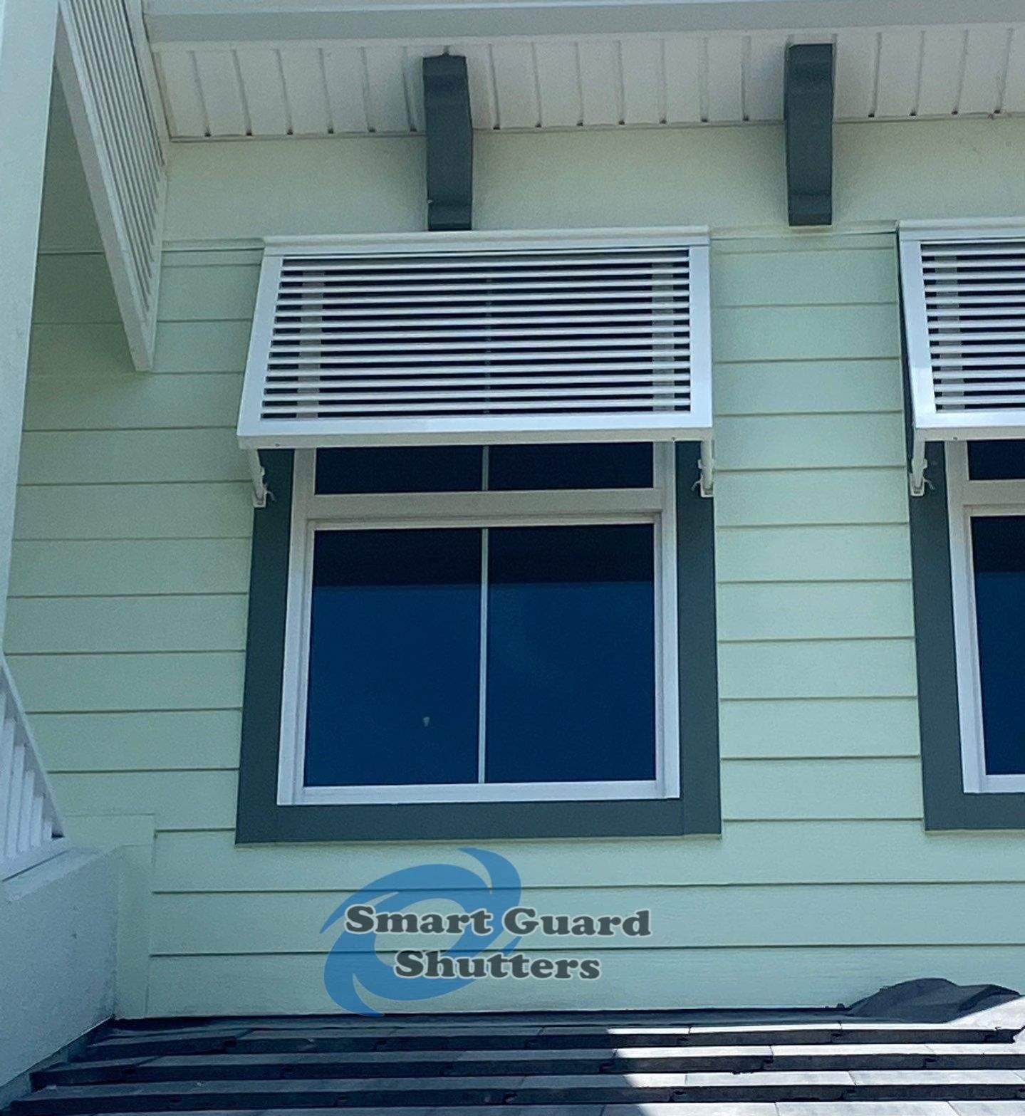 Decorative Bahama Shutters in Traffic White by Smart Guard Shutters