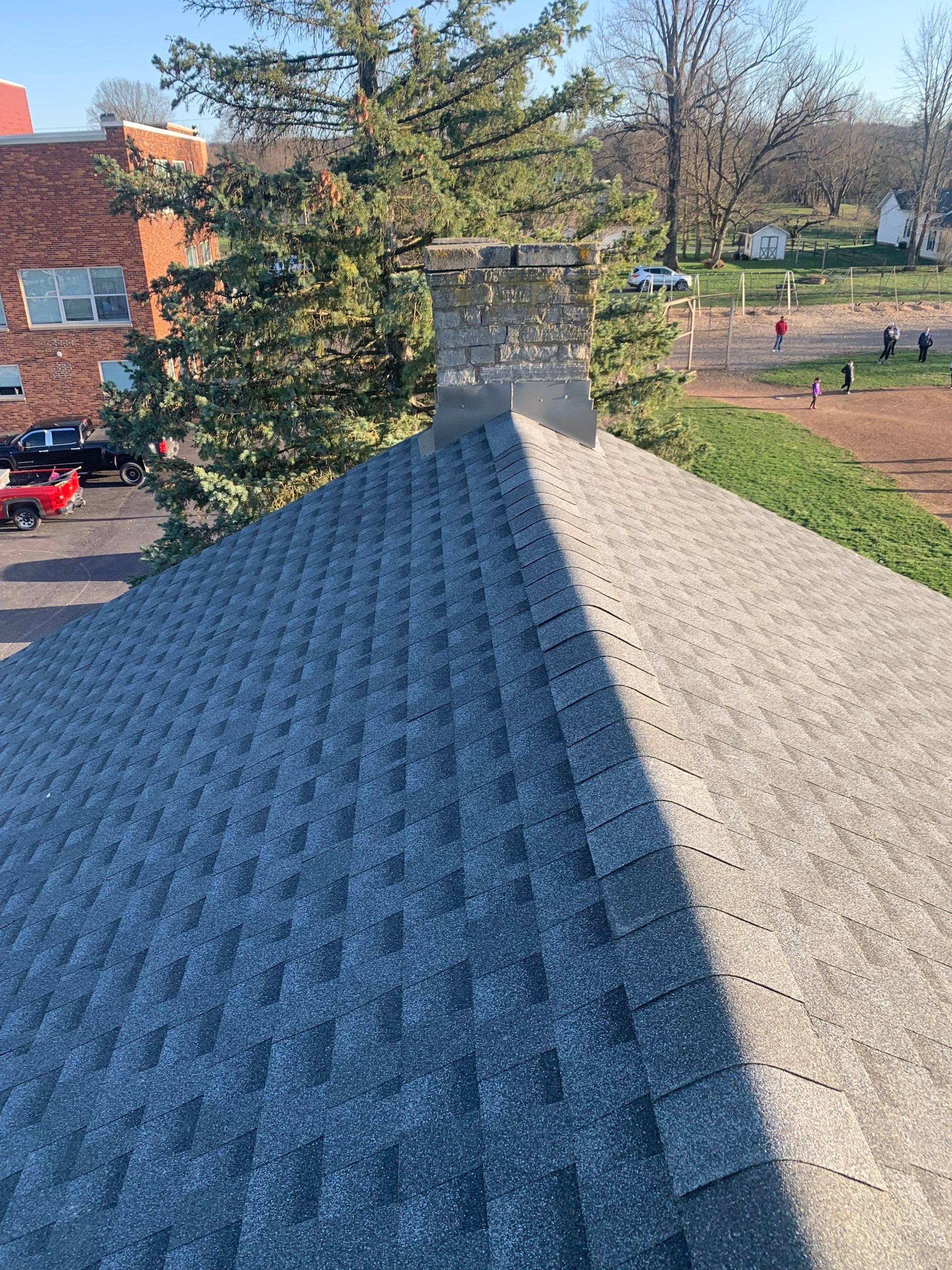 Commercial Roofing Installation using Timberline HDZ Shingles - Pewter Gray by RoofX 