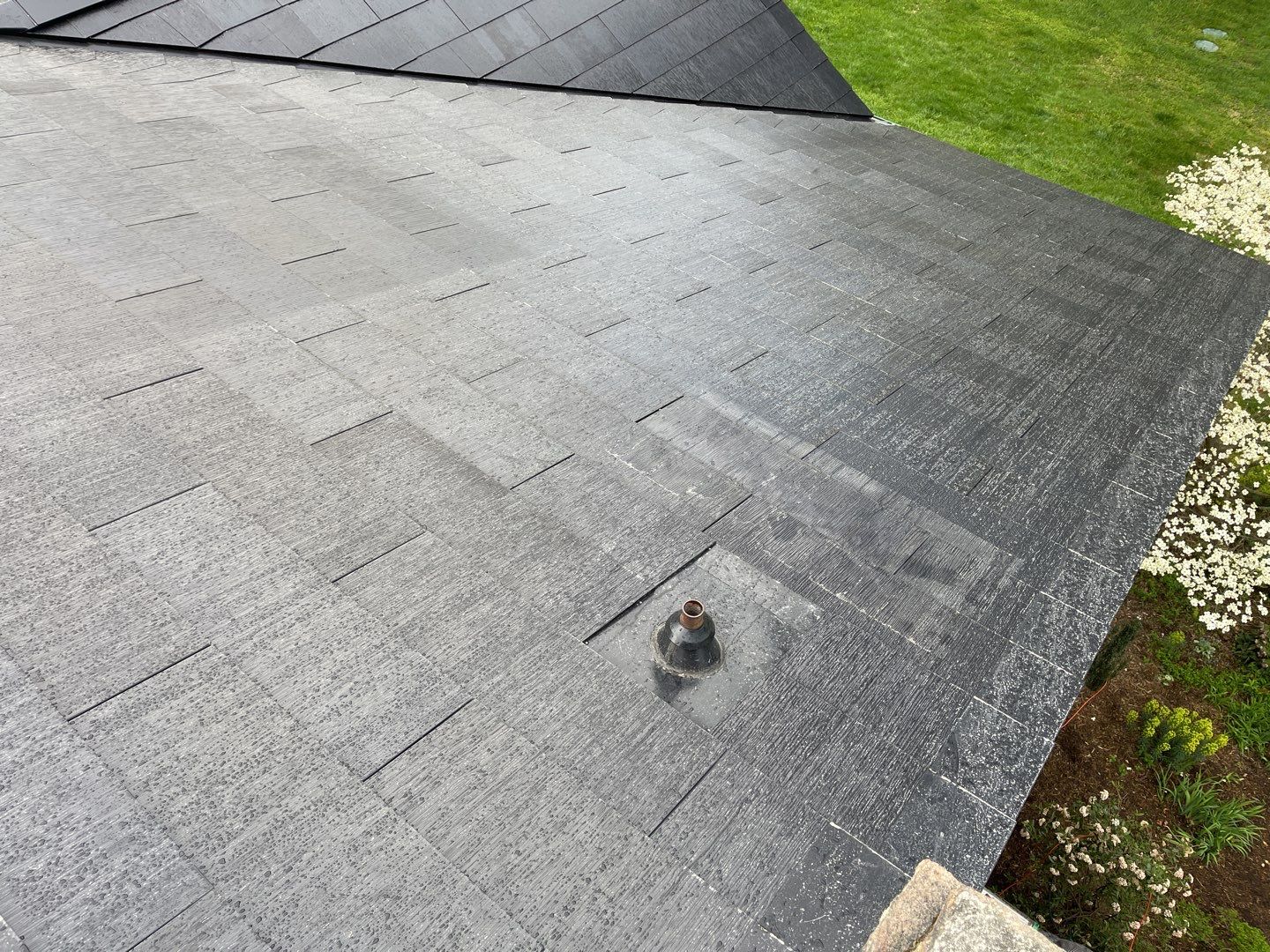 Tesla Solar Roof Replacement by American Home Contractors