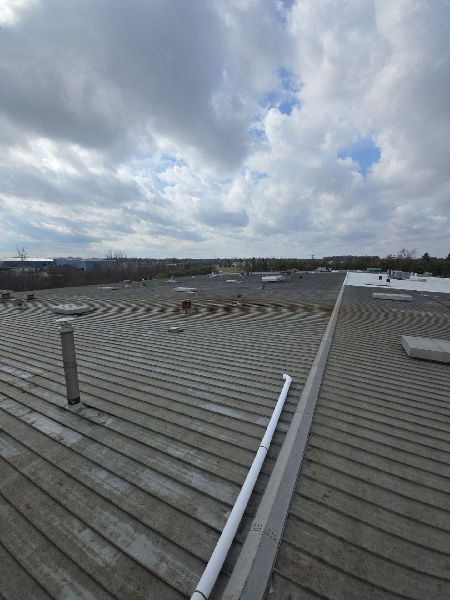 Commercial Metal and Flat Roof Repairs in Mason, Ohio by Level Up Roofing and Restoration Services LLC