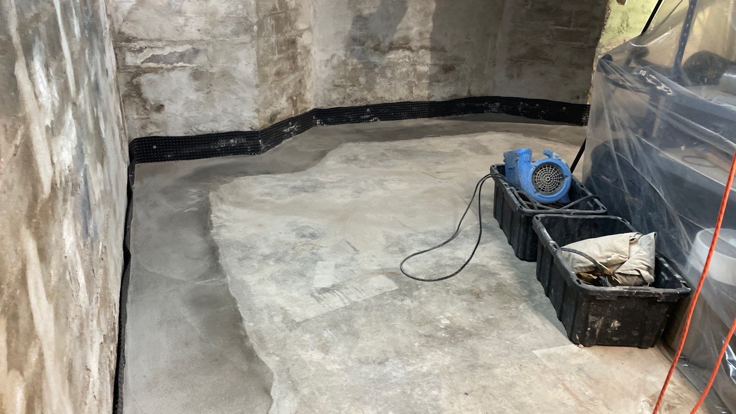 Interior Drain Tile & Foundation Crack Repair in Northeast Minneapolis by Waterproofing Northeast