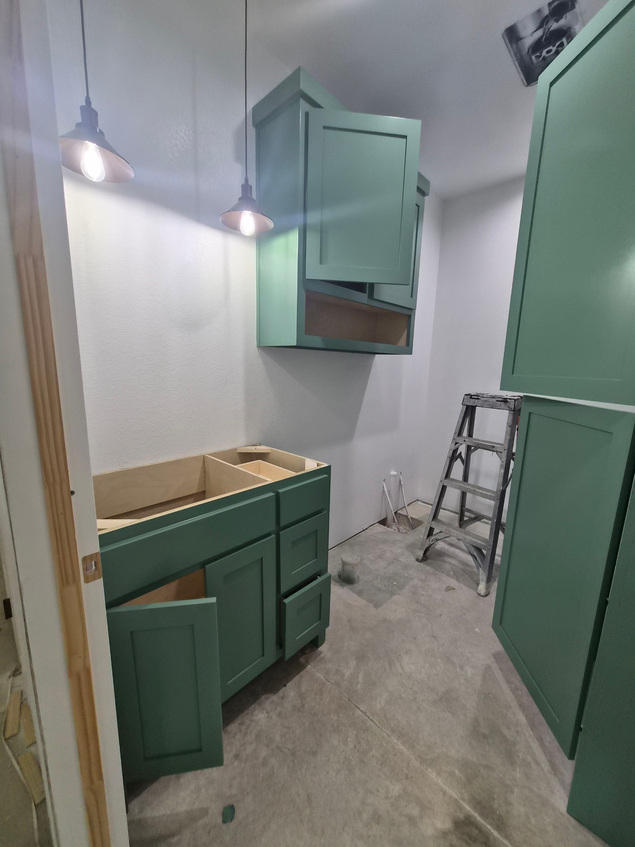 Sage Green Cabinet Transformation in Brownsboro, TX! by Quality Coats Painting