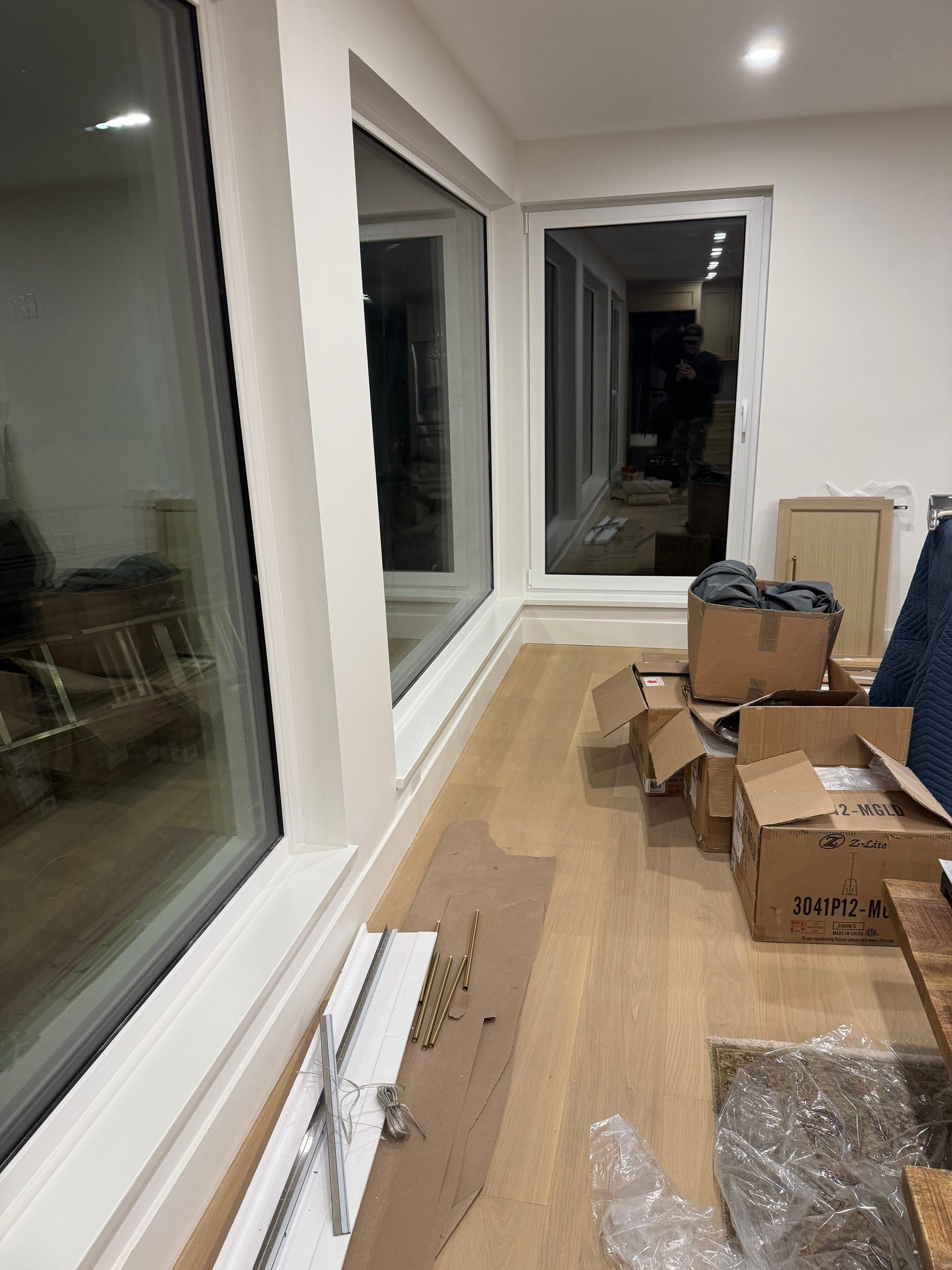 West Vancouver Custom Millwork: Heat Pump Trim & Window Finishing by YVR Construction Group