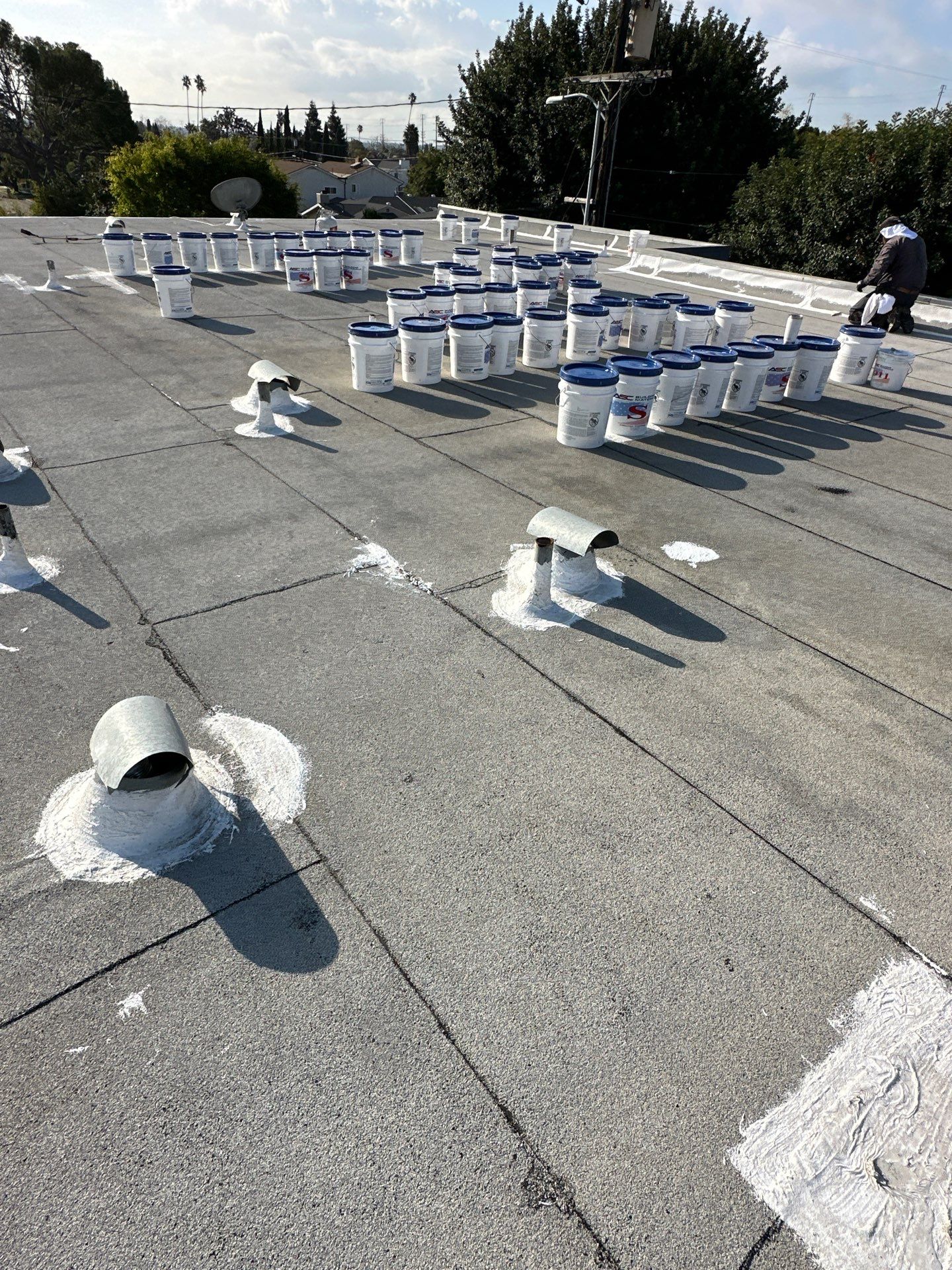 Apartment Building - Silicone Installation using ASC's Silicone Membrane by Hull Brothers Roofing