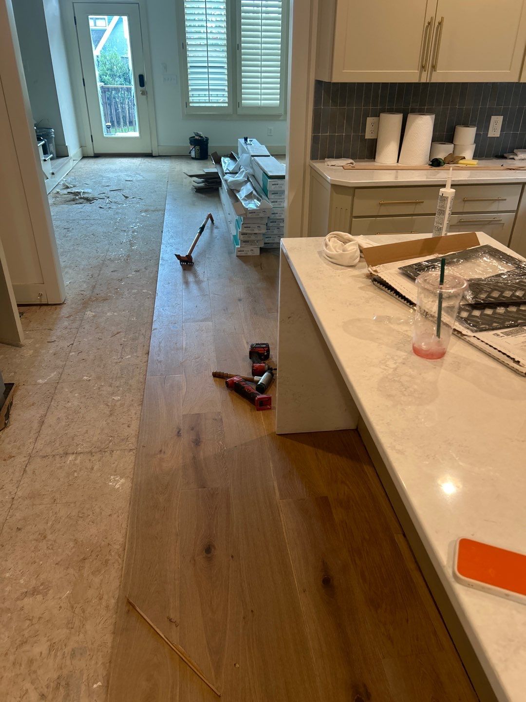 White Oak Hardwood and Checkerboard Tile Installation by Footprints Floors of Nashville