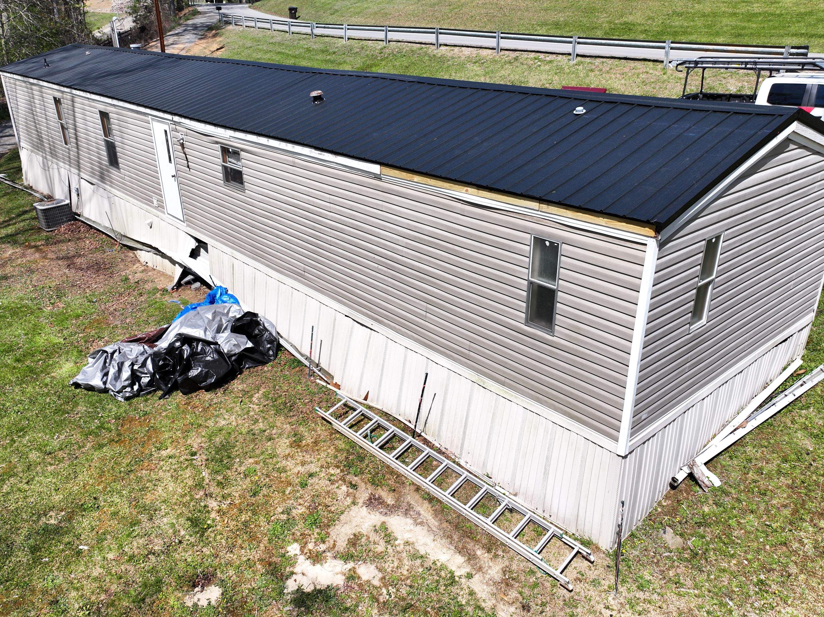 Residential Roofing Installation using 29 Gauge AG Panel by Omnia Roofing