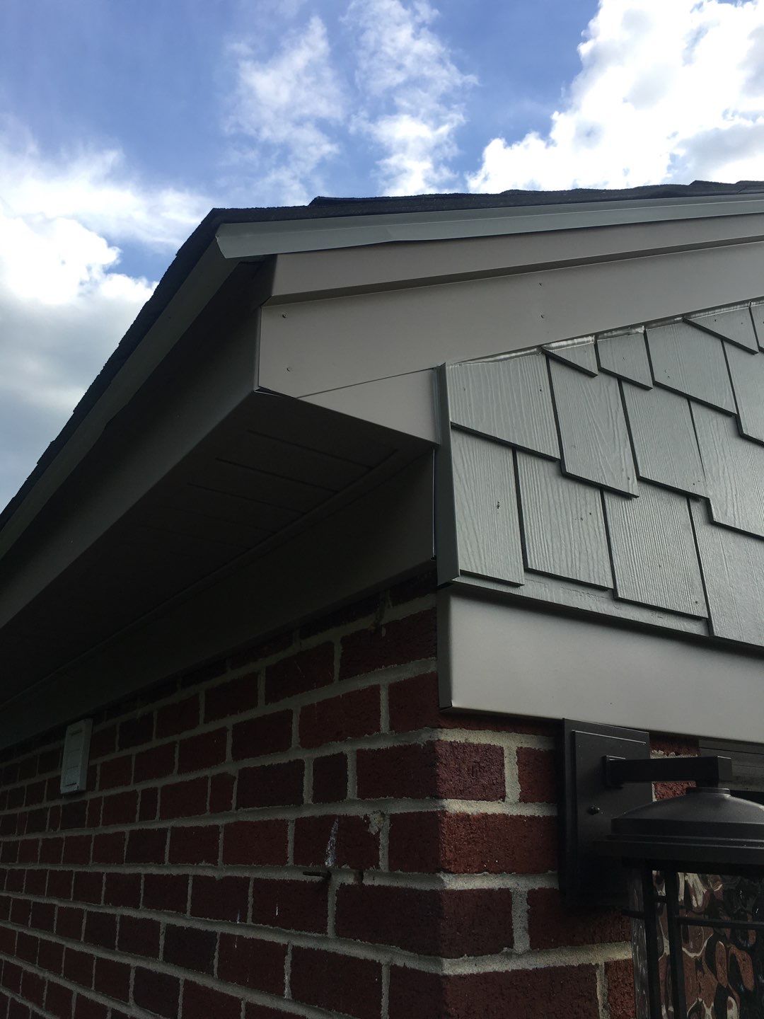 Gutter and Siding Replacement by American Home Contractors