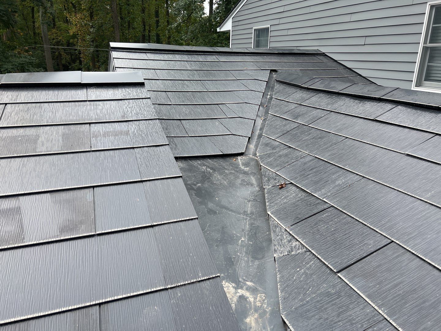 Tesla Solar Roof Replacement using Tesla Solar Roof V3 Tiles by American Home Contractors