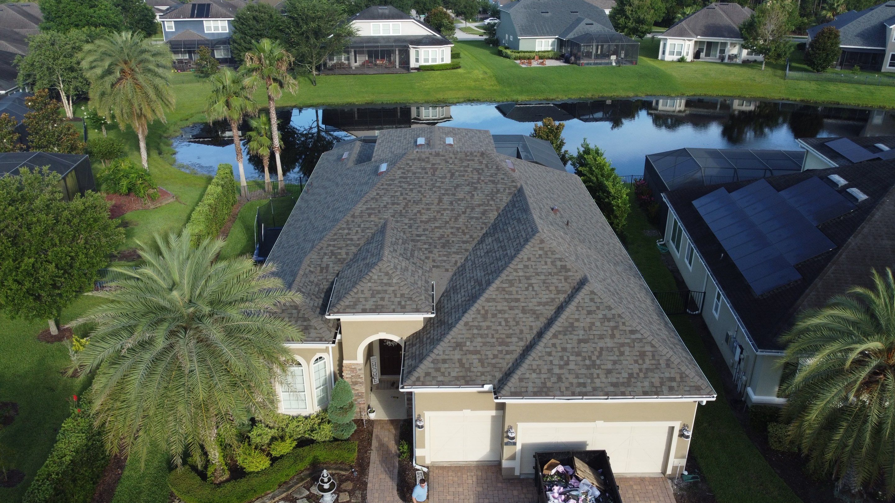 Ponte Vedra Residential Roof Replacement with Driftwood Architectural Asphalt Shingles by Trinity Restoration and Roofing LLC
