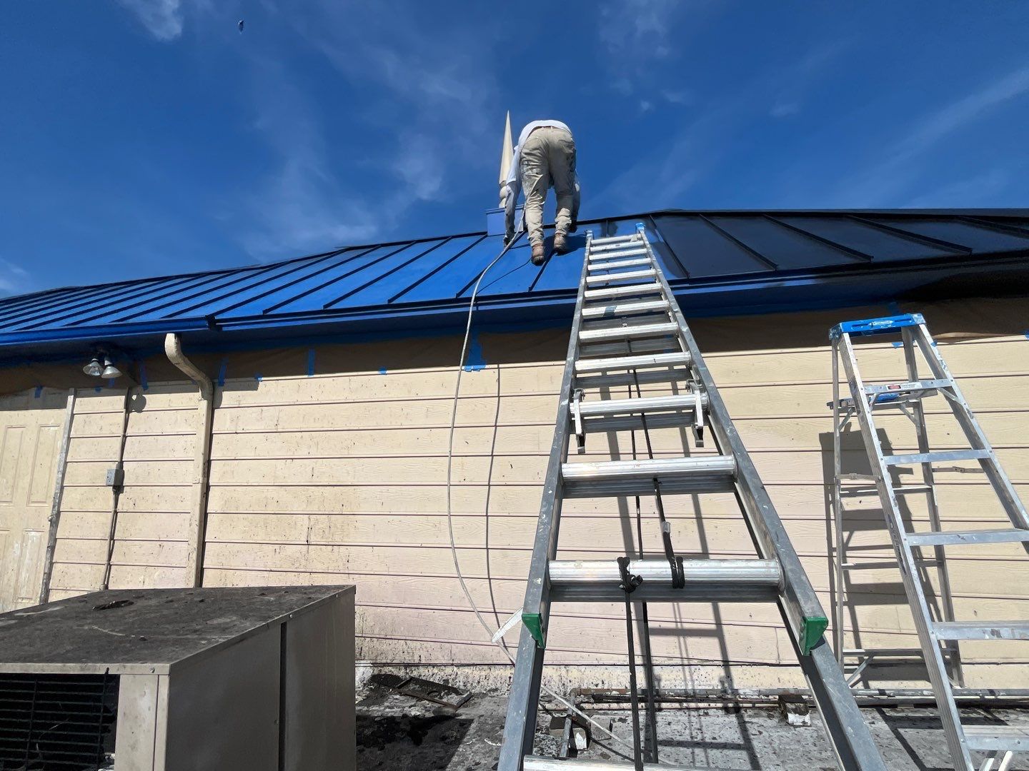 Roof painting, Jose Tequilas Norfolk, VA by AKK Painting LLC