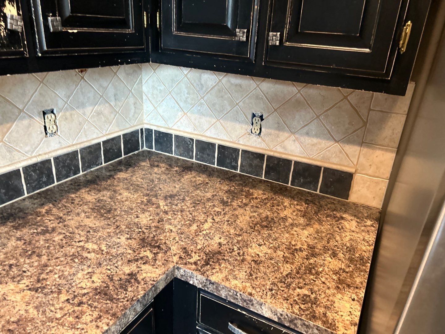 Subway tile backsplash  by Footprints Floors of Nashville