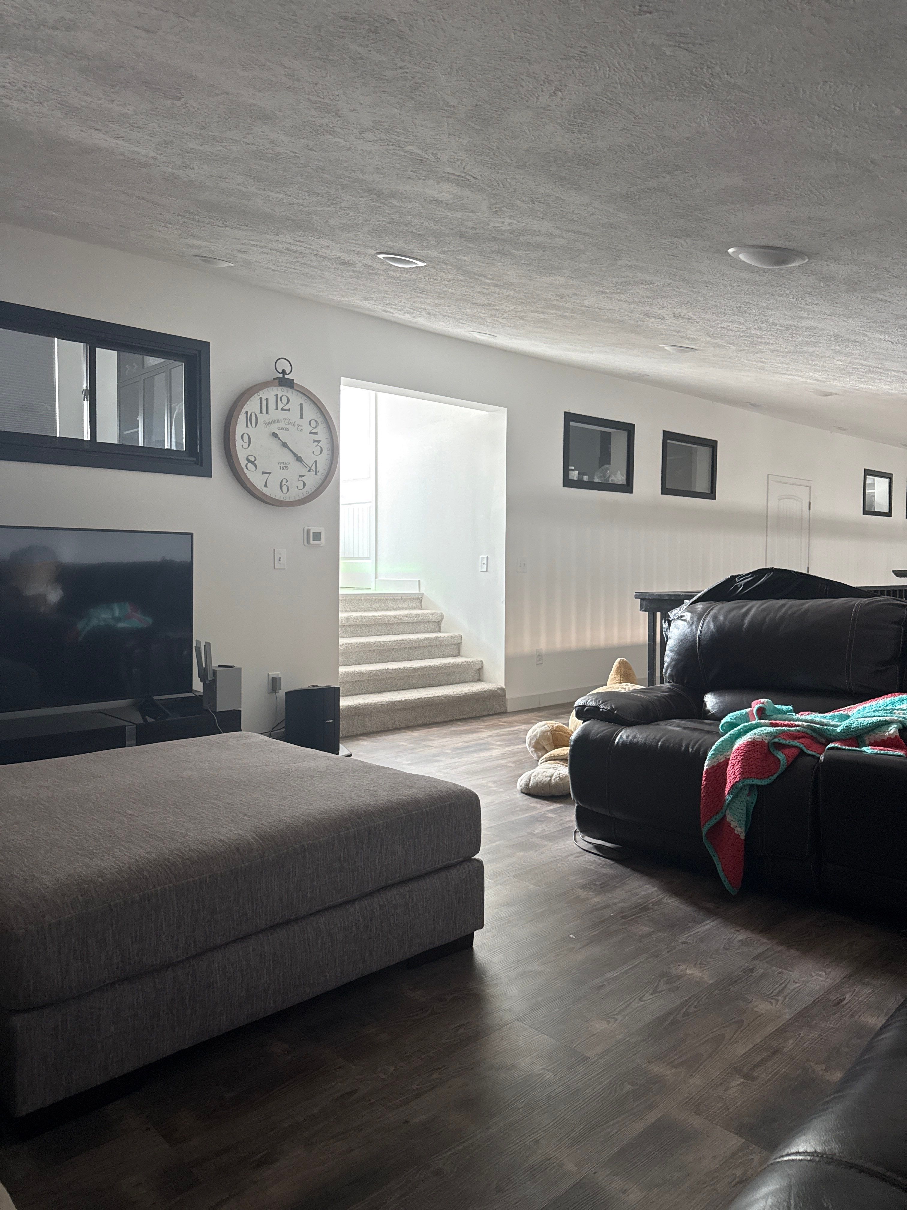 Scottsbluff Living Room Floor Remodel with Luxury Vinyl Planks by CompanyCam Sales Demo